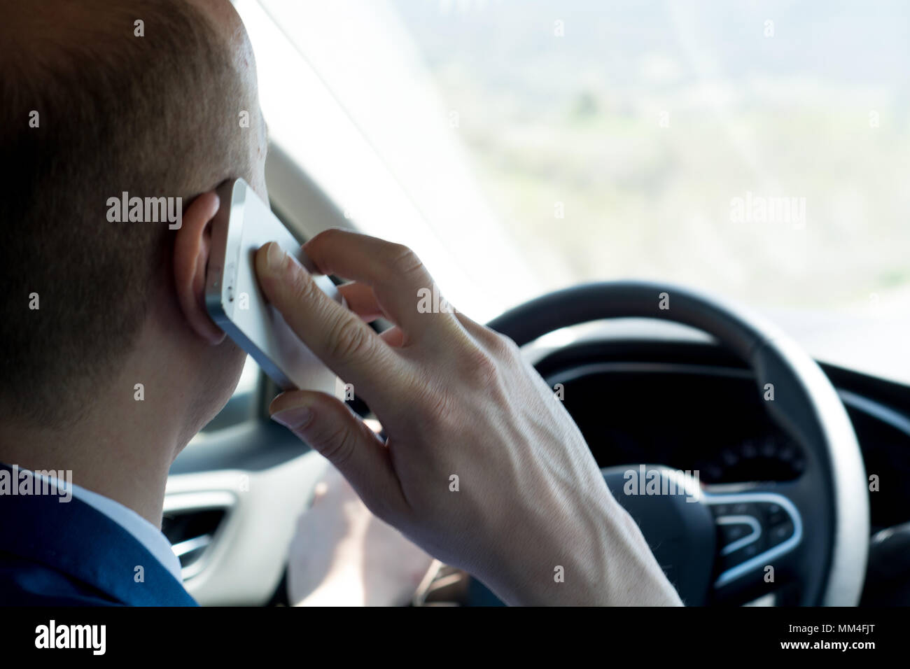 Using mobile phone in car Stock Photo Alamy