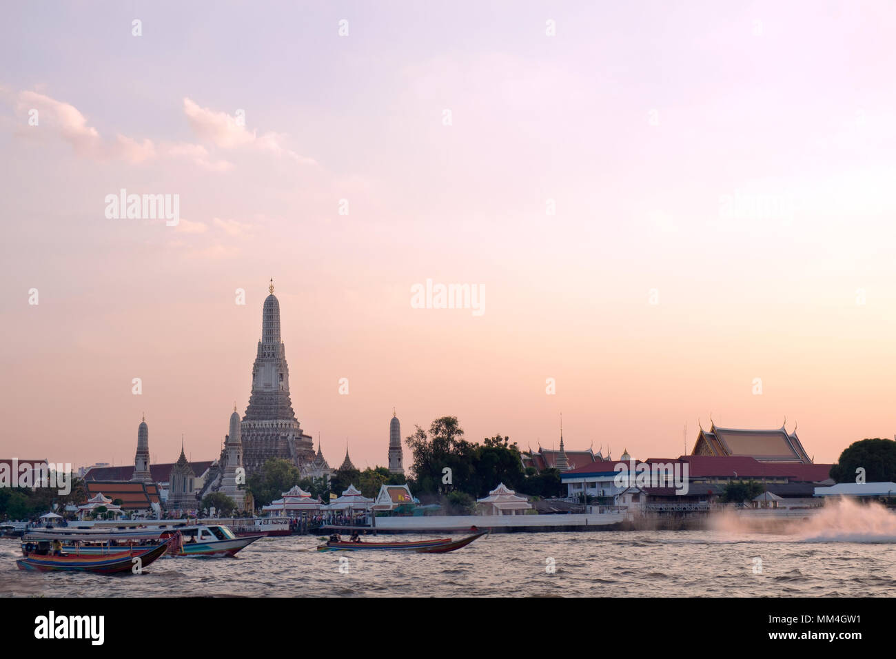 Wat Arun Buddhist religious places at sunset. Stock Photo