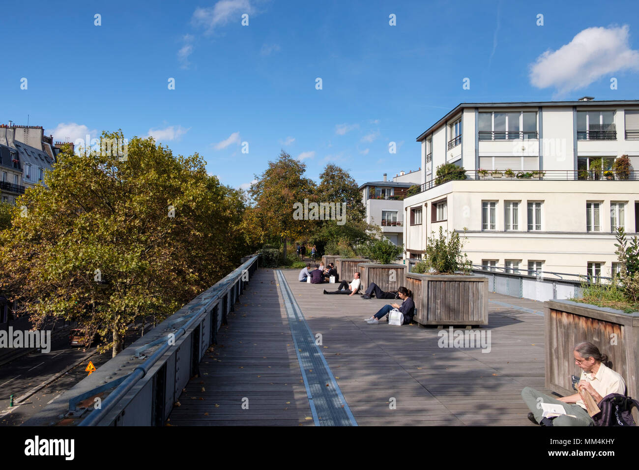 People enjoying The Promenade Plantée or Coulée verte René-Dumont, Elevated park in 12th arrondissement, Paris, France Stock Photo