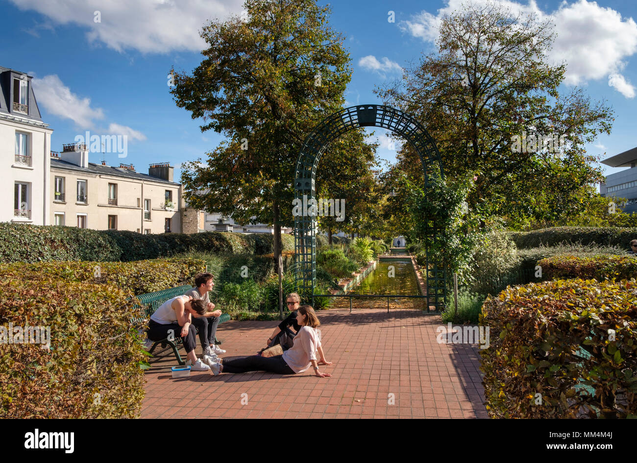 People enjoying The Promenade Plantée or Coulée verte René-Dumont, Elevated park in 12th arrondissement, Paris, France Stock Photo