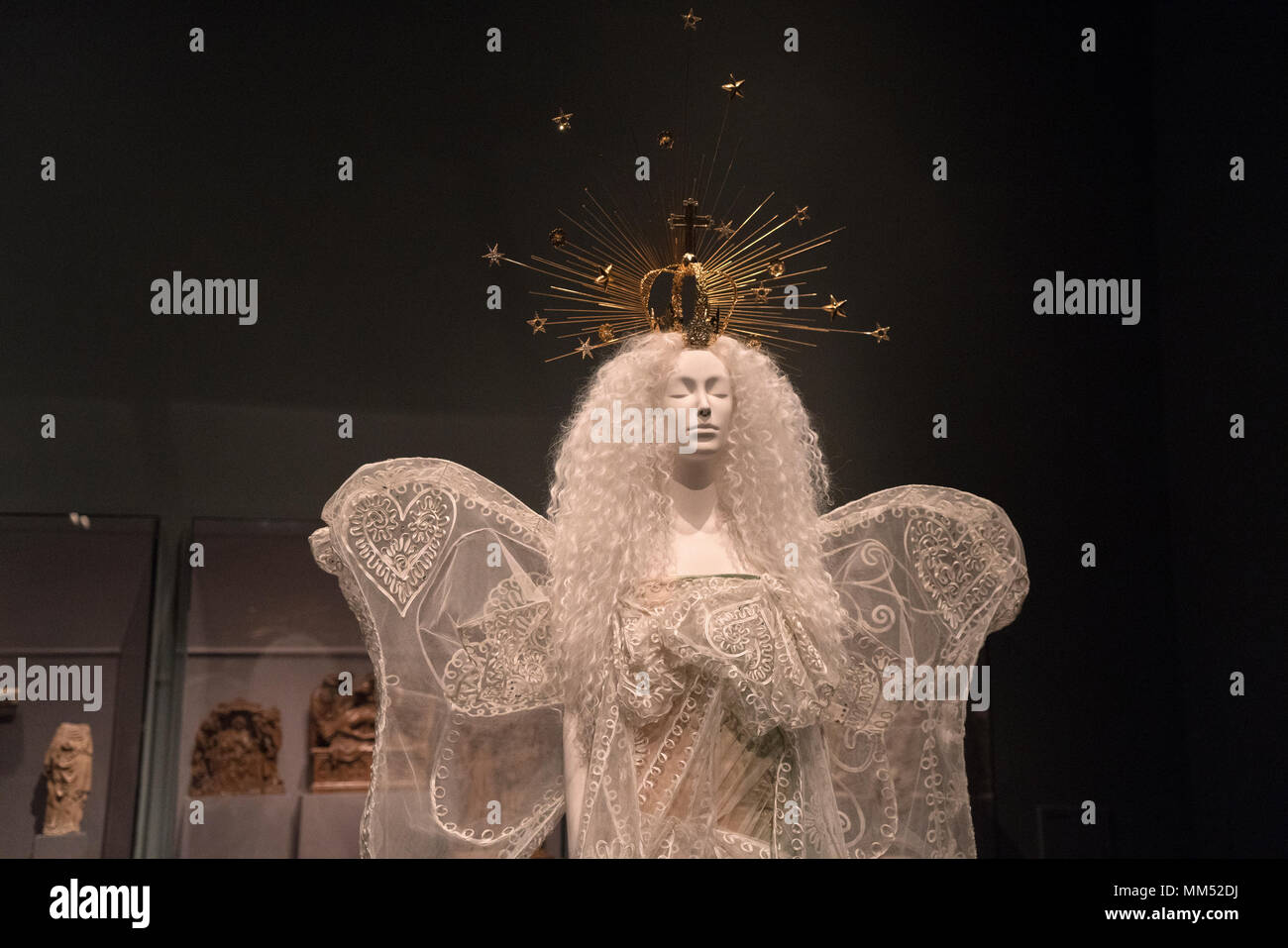 A wedding dress by John Galliano of the House of Dior in “Heavenly Bodies: Fashion and the Catholic Imagination' at the Metropolitan Museum of Art. Stock Photo