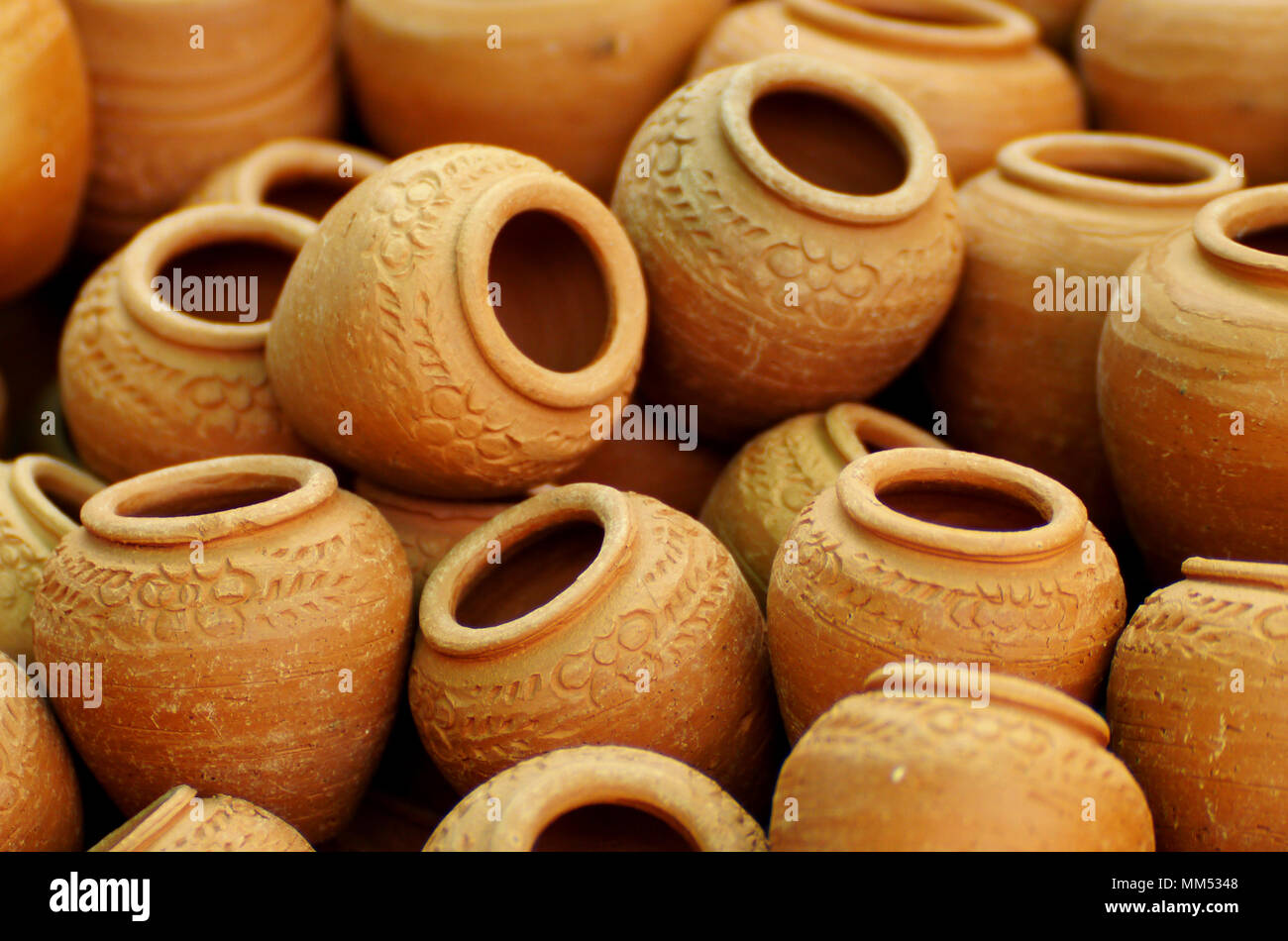 The group of small clay pots, use for background Stock Photo - Alamy