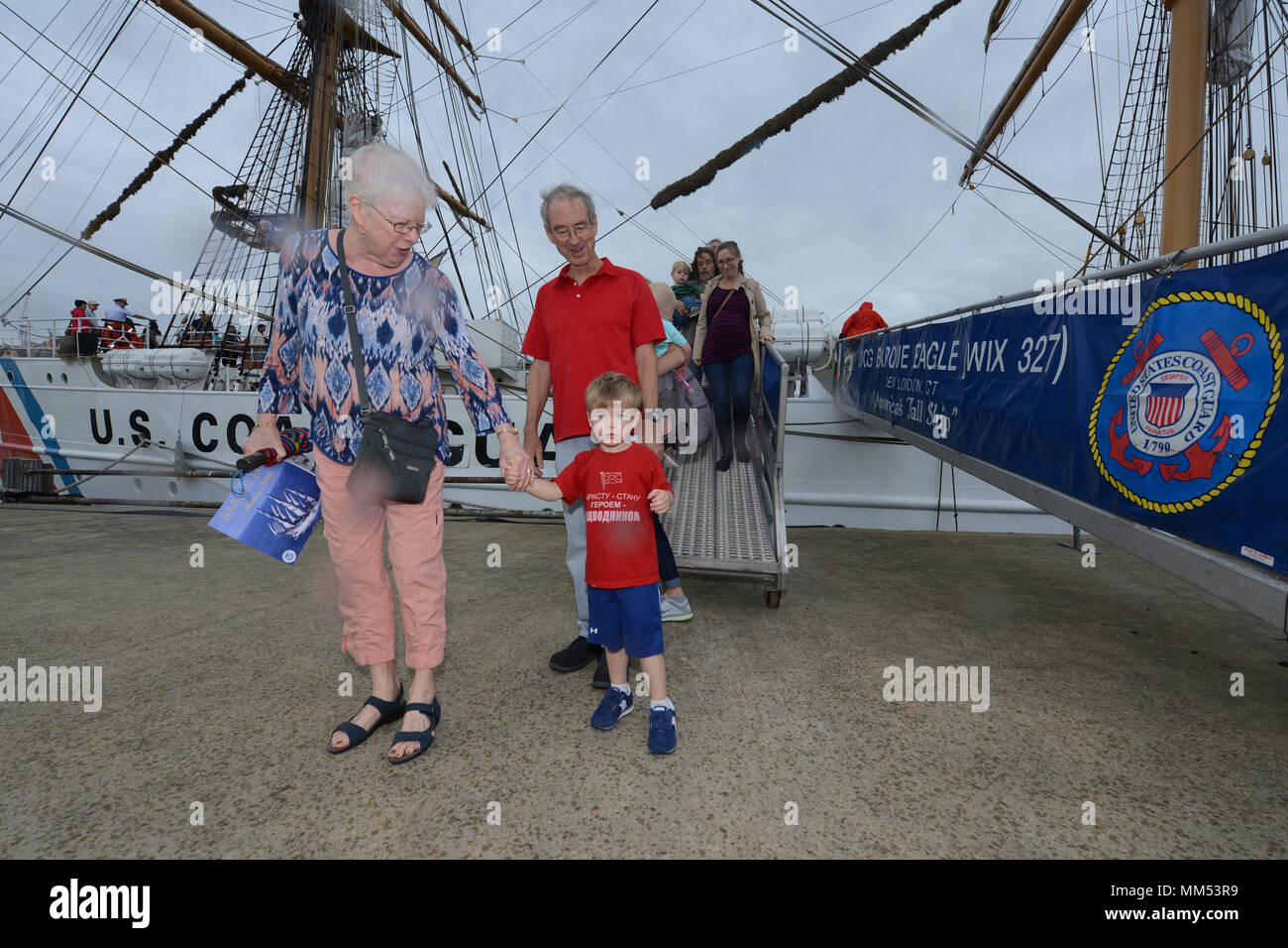 Members of the public disembark the Coast Guard Cutter Barque Eagle