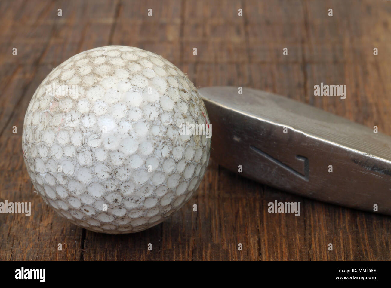 Antique golf club and ball Stock Photo - Alamy