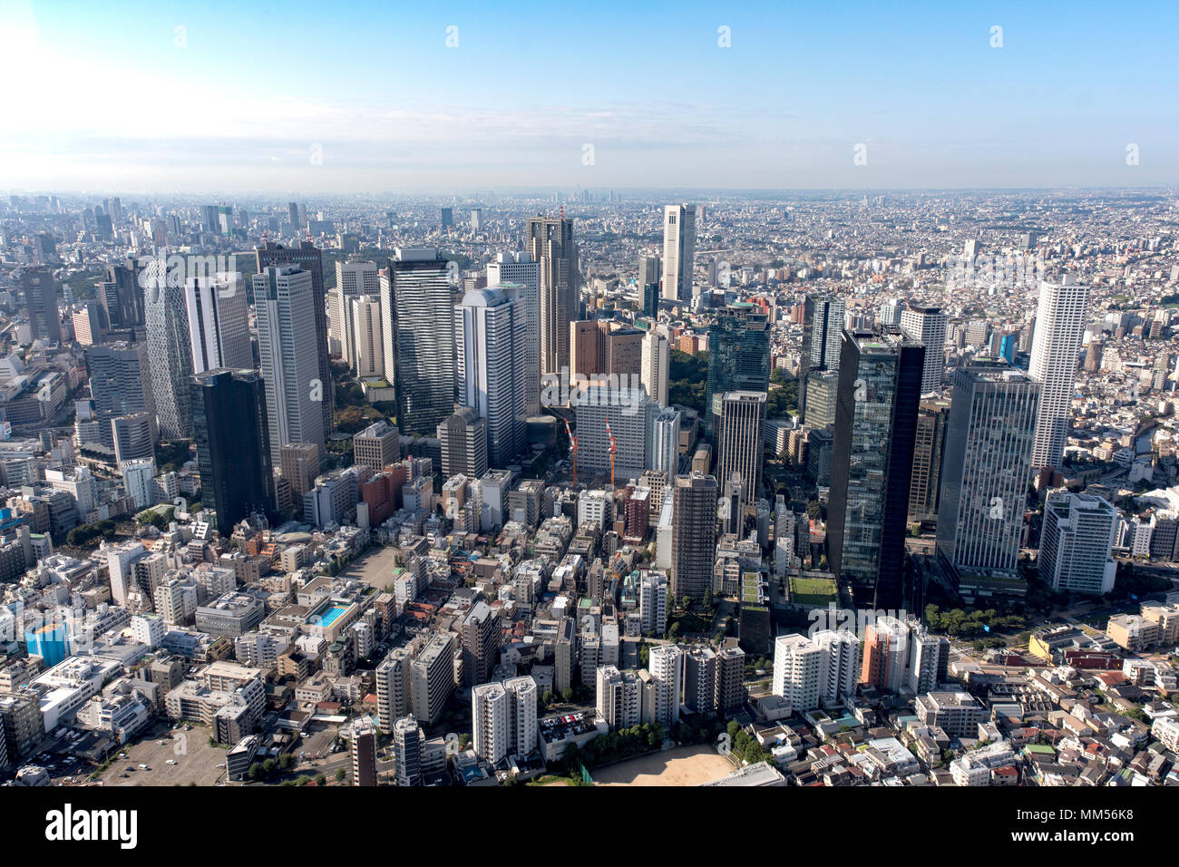 An aerial view of Shinjuku’s skyscraper district from a UH-1N Iroquois assigned to the 459th Airlift Squadron, Sept. 3, 2017, during the Tokyo Metropolis Comprehensive Disaster Prevention Drill. Shinjuku is a special ward in Tokyo, Japan. It is a major commercial and administrative center for the government of Tokyo. The ward has an estimated population of 337,556. (U.S. Air Force photo by Yasuo Osakabe) Stock Photo