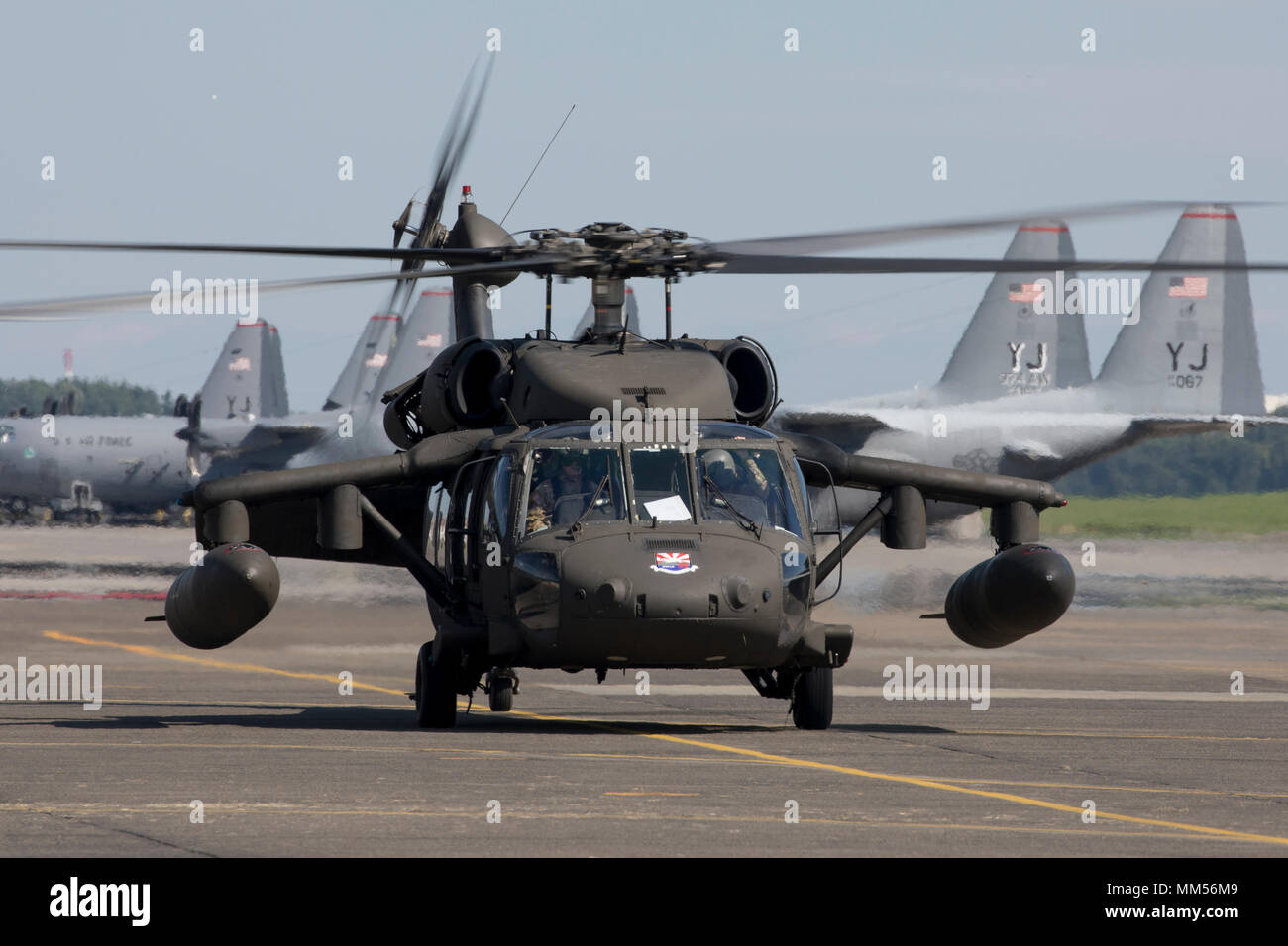 A U.S. Army UH-60 Black Hawk helicopter assigned to the U.S. Army Aviation Battalion-Japan based at Camp Zama taxis on the flight line at Yokota Air Base, Japan, Sept. 3, 2017, during the Tokyo Metropolis Comprehensive Disaster Prevention Drill. U.S. military helicopters from Naval Air Facility Atsugi, Camp Zama, and Yokota participated in the drill where humanitarian supplies were offloaded from each aircraft at Yokota to simulate the interoperability of U.S. and Tokyo Metropolitan Government in responding to a natural disaster. (U.S. Air Force photo by Yasuo Osakabe) Stock Photo