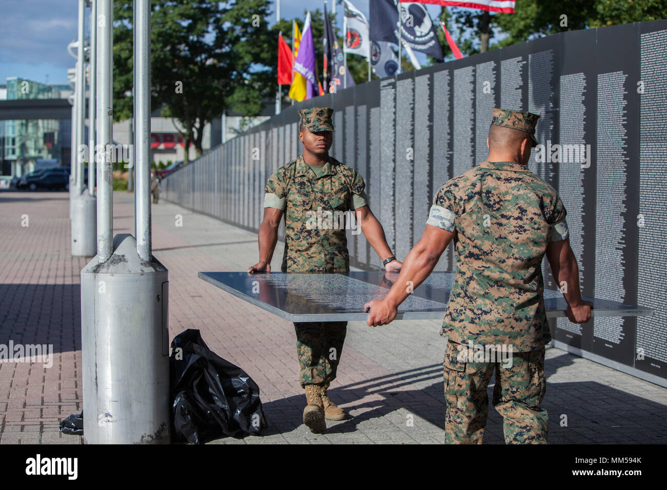 U.S. Marines with Special Purpose Marine Air Ground Task Force Detroit assist in setting up the Traveling Vietnam Memorial Wall as part of Marine Week Detroit, Sept. 8, 2017. Marine Week Detroit is an opportunity to commemorate the unwavering support of the American people, and show the Marine Corps’ continued dedication to protecting the citizens of this country. Stock Photo