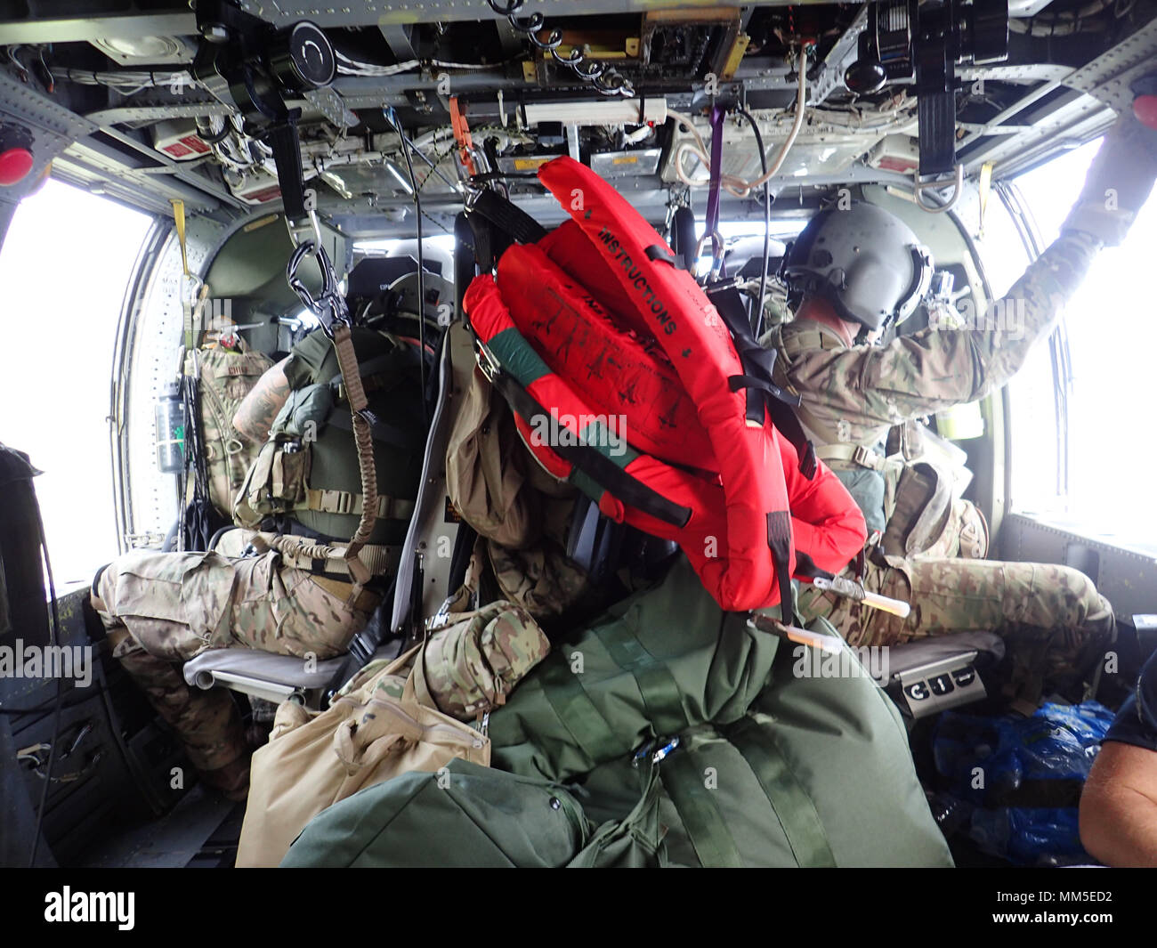Scan Rescue Mission Airmen of the New York Air National Guard's 106th Rescue Squadron scan ...