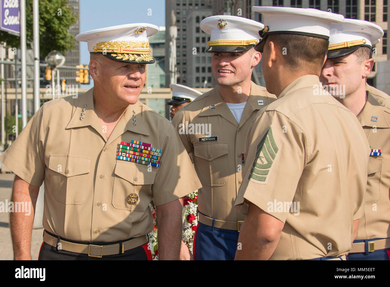 Commandant of the Marine Corps Gen. Robert B. Neller, left, speaks with  Marines after a 9/11 remembrance ceremony at Hart Plaza, Detroit, Mich.,  Sept. 10, 2017. The ceremony was held in honor