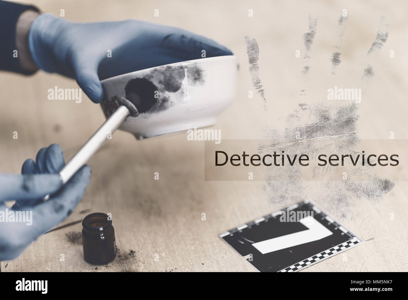 Detective services. Specialist conducting searches and takes samples of ...