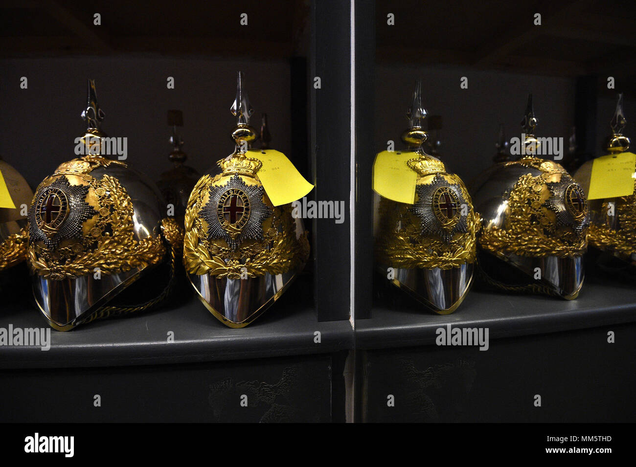 Helmets Reflected In A Mirror In The Full Dress Store During A
