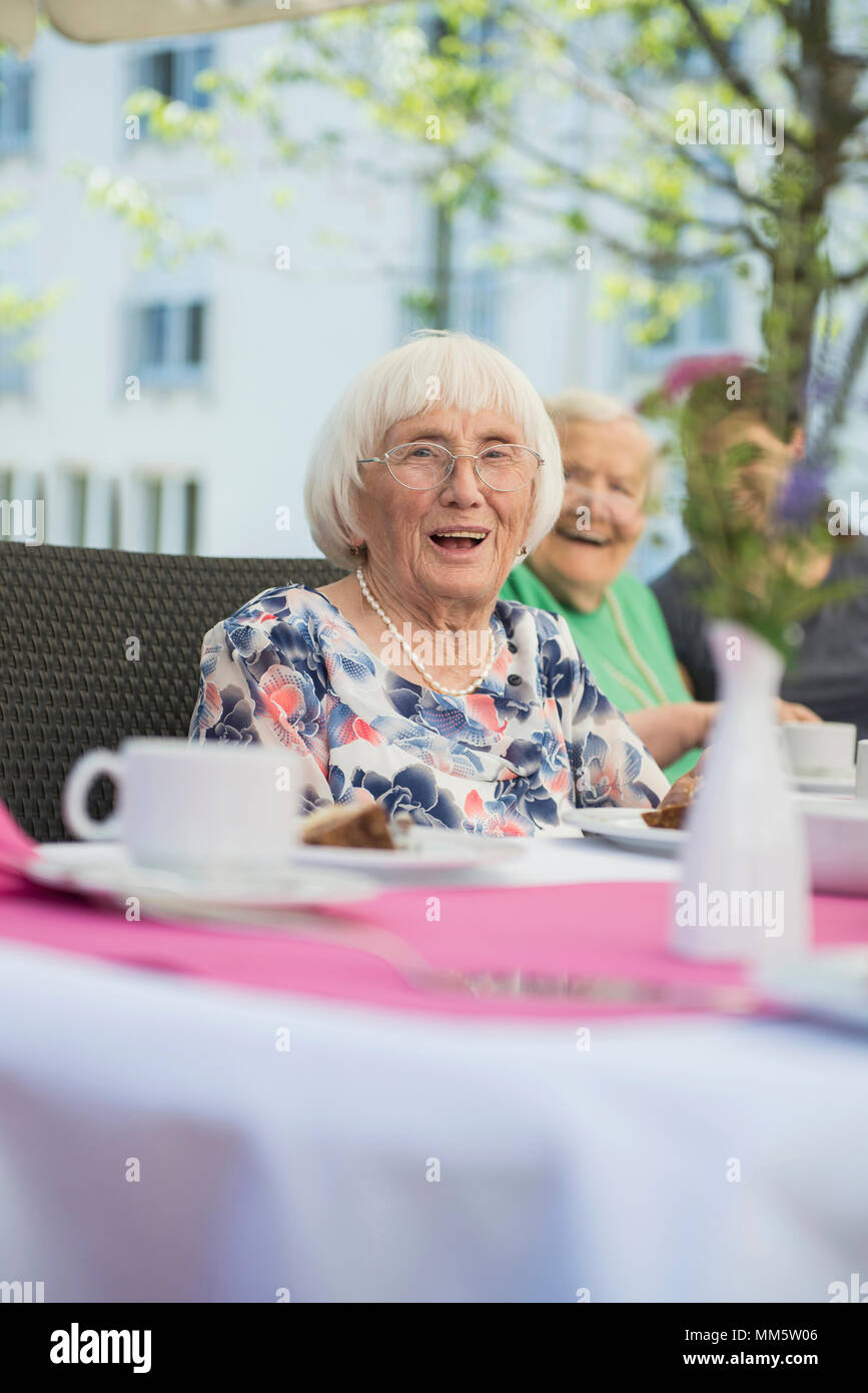 Senior woman breakfast table hi-res stock photography and images - Alamy