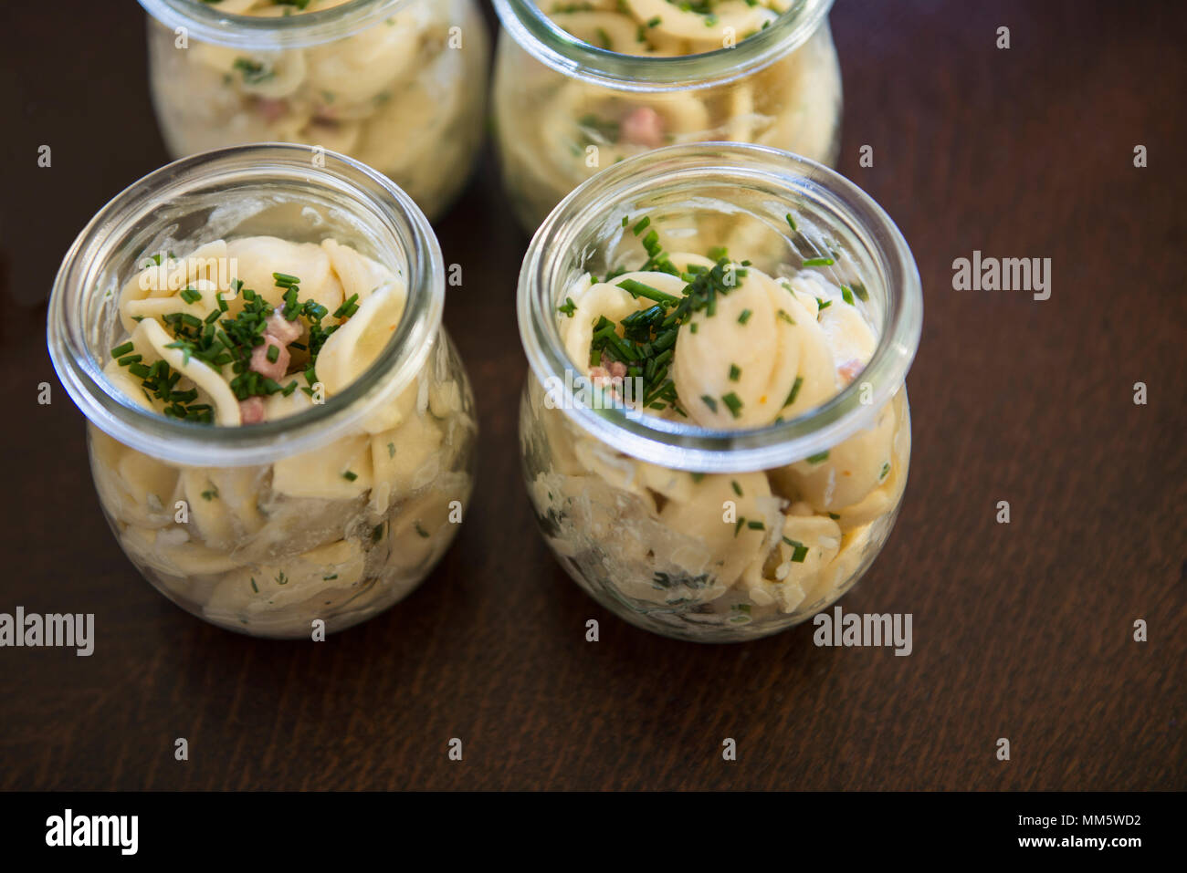 Pasta shells as appetizers in jar Stock Photo Alamy