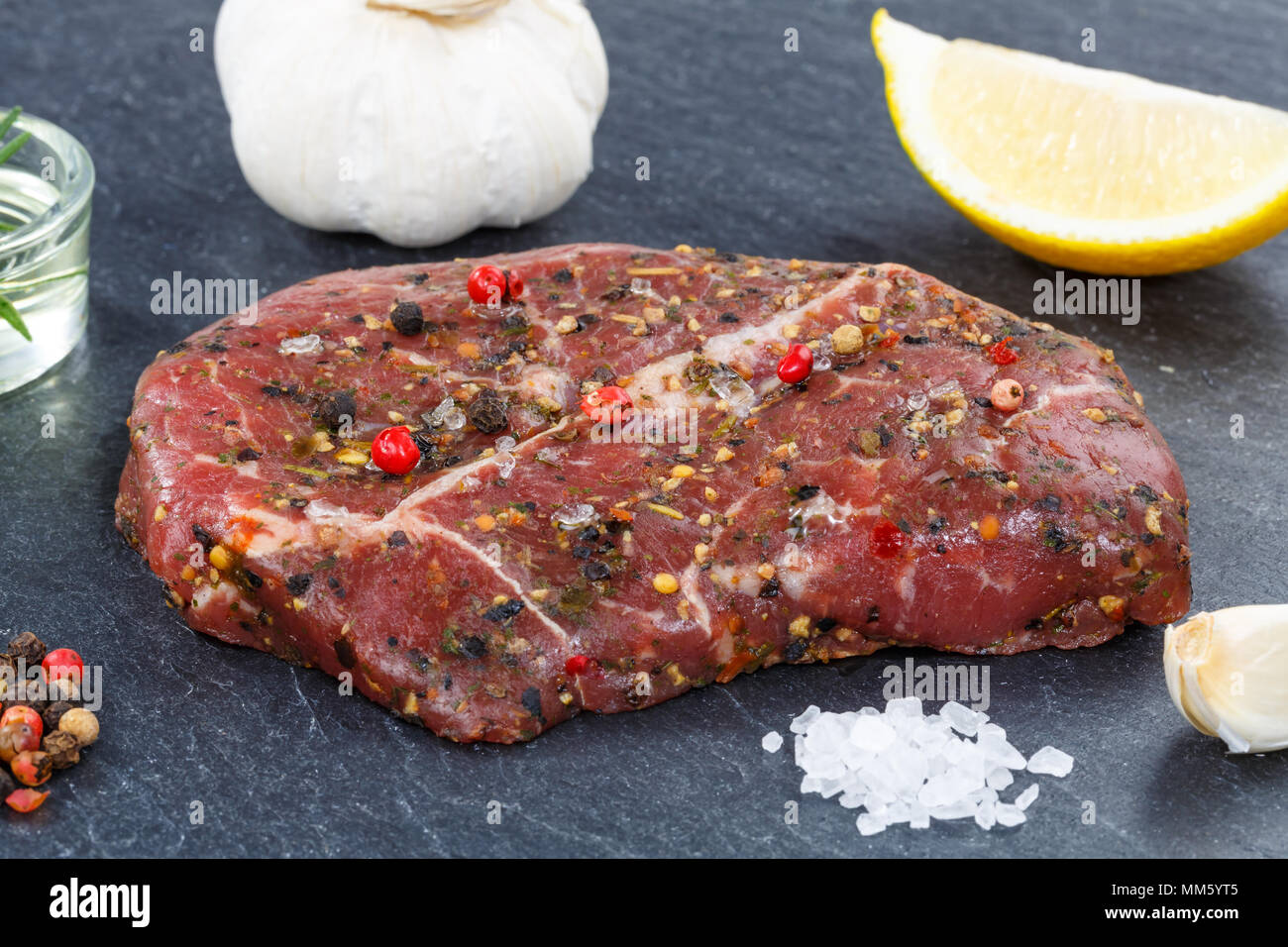 Meat raw beef steak on slate top view Stock Photo