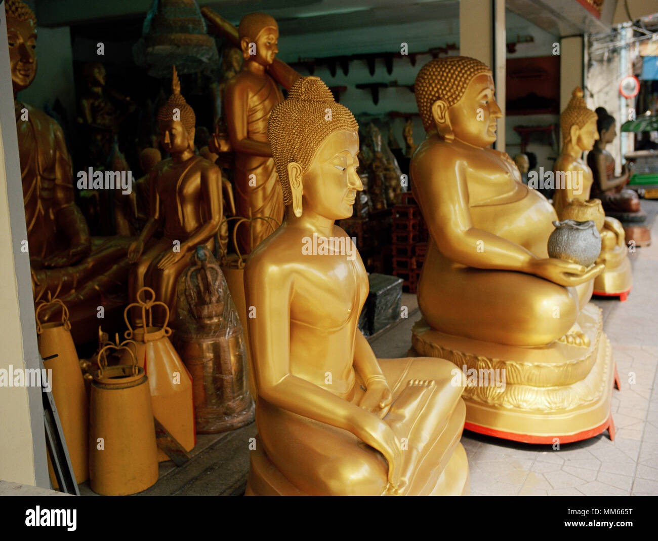 Thai Buddhism - Buddha statue art for sale in Bamrung Muang Road in Bangkok in Thailand in Southeast Asia Far East. Buddhist Serenity Serene Travel Stock Photo