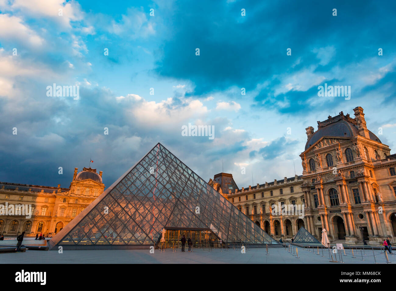 Evening sky at sunset over the courtyard of Musee du Louvre, Paris, France Stock Photo