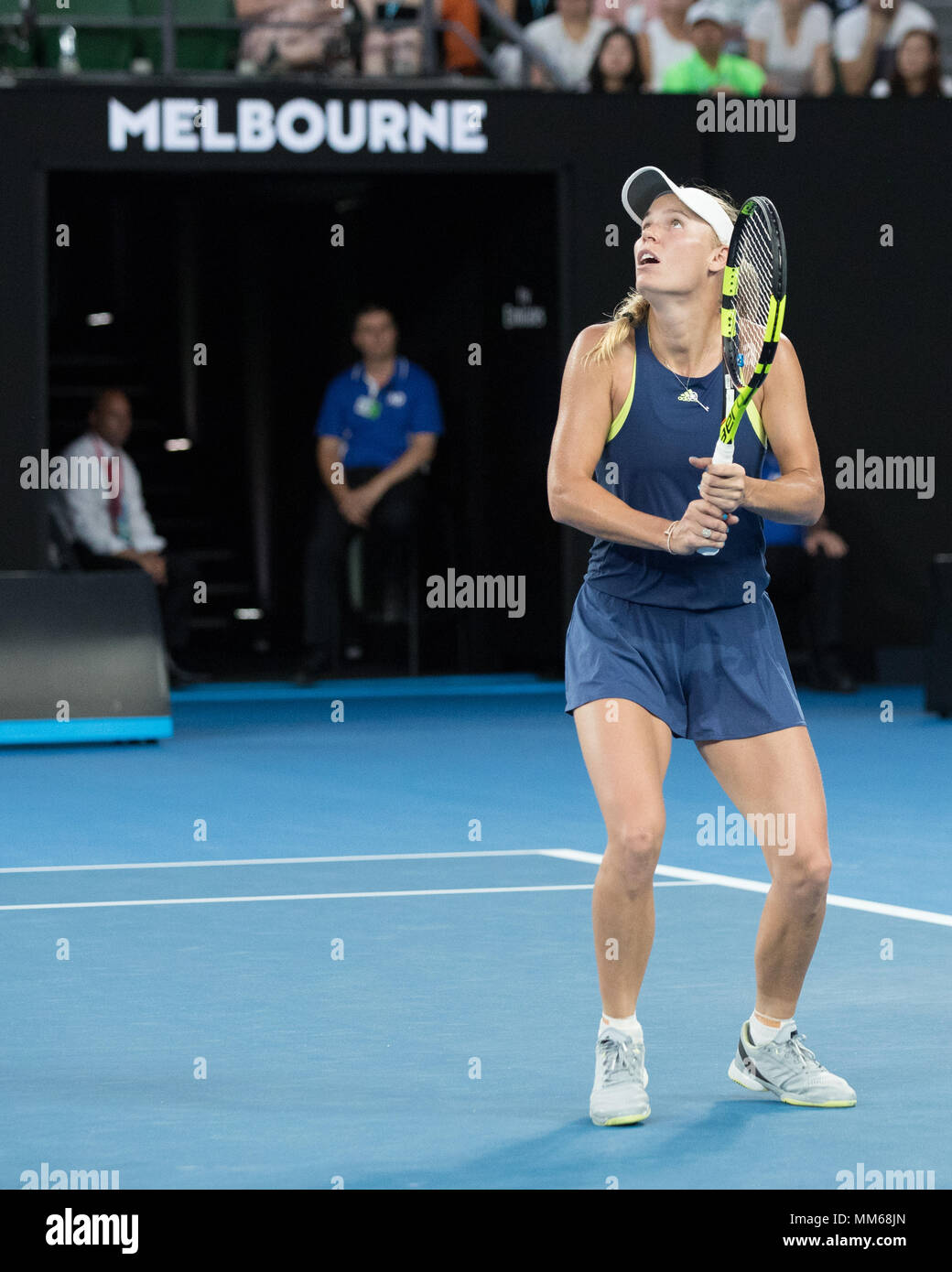 Danish tennis player Caroline Wozniacki playing backhand shot in Australian Open 2018 Tennis Tournament, Melbourne Park, Melbourne, Victoria, Australi Stock Photo