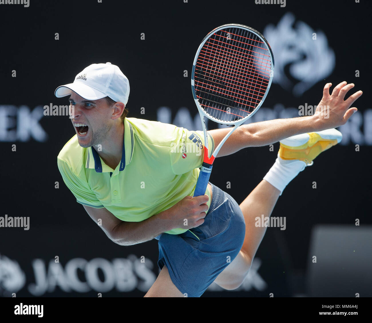 Austrian tennis player Dominic Thiem hitting a service shot in Australian Open Tennis Tournament, Melbourne Park, Melbourne, Victoria, Australia Stock Photo - Alamy