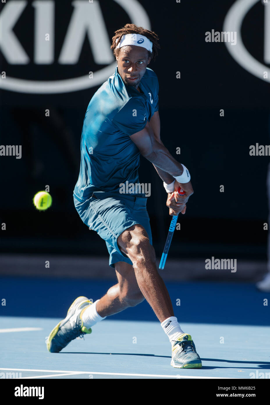 French tennis player Gael Monfils playing backhand shot in Australian Open  2018 Tennis Tournament, Melbourne Park, Melbourne, Victoria, Australia  Stock Photo - Alamy