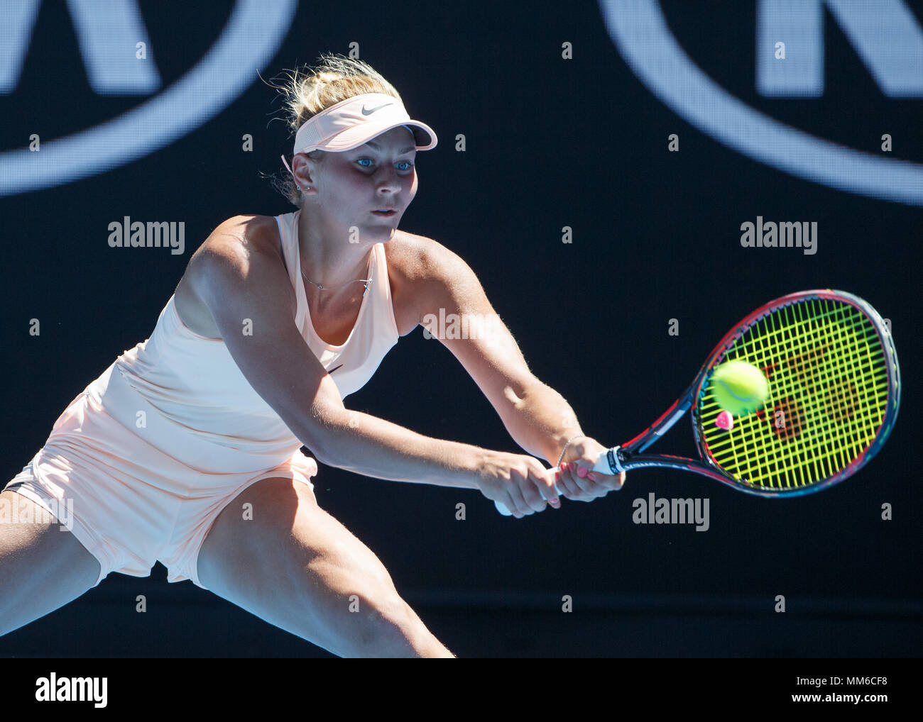 Ukrainian tennis player Marta Kostyuk playing backhand shot in Australian  Open 2018 Tennis Tournament, Melbourne Park, Melbourne, Victoria, Australia  Stock Photo - Alamy