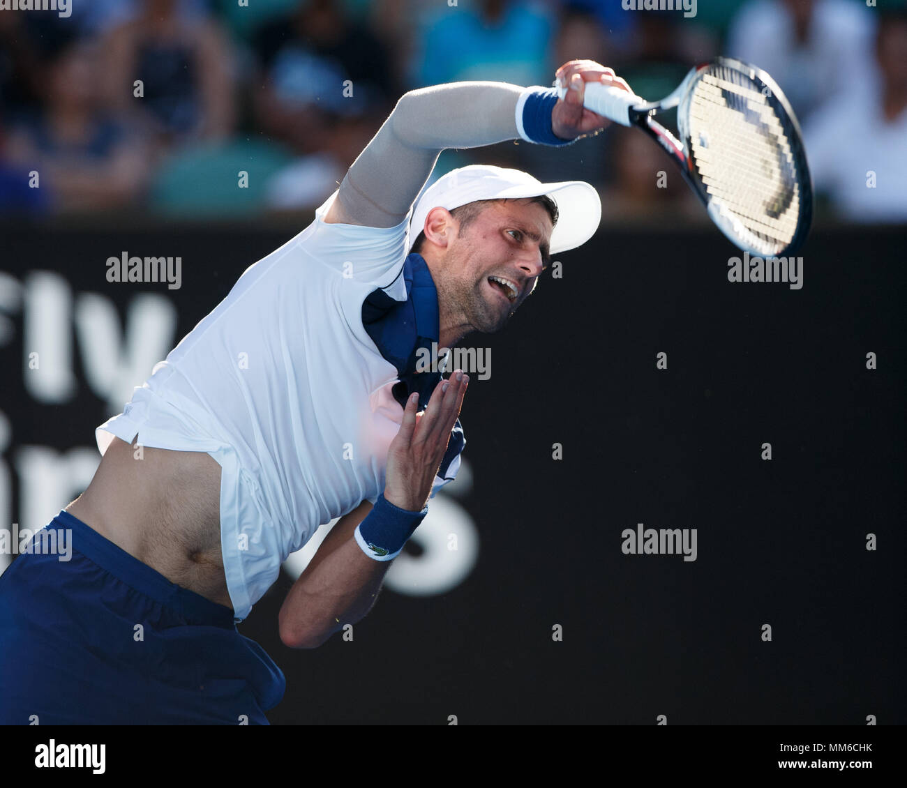 Serbian tennis player Novak Djokovic playing service shot at Australian  Open 2018 Tennis Tournament, Melbourne Park, Melbourne, Victoria, Australia  Stock Photo - Alamy