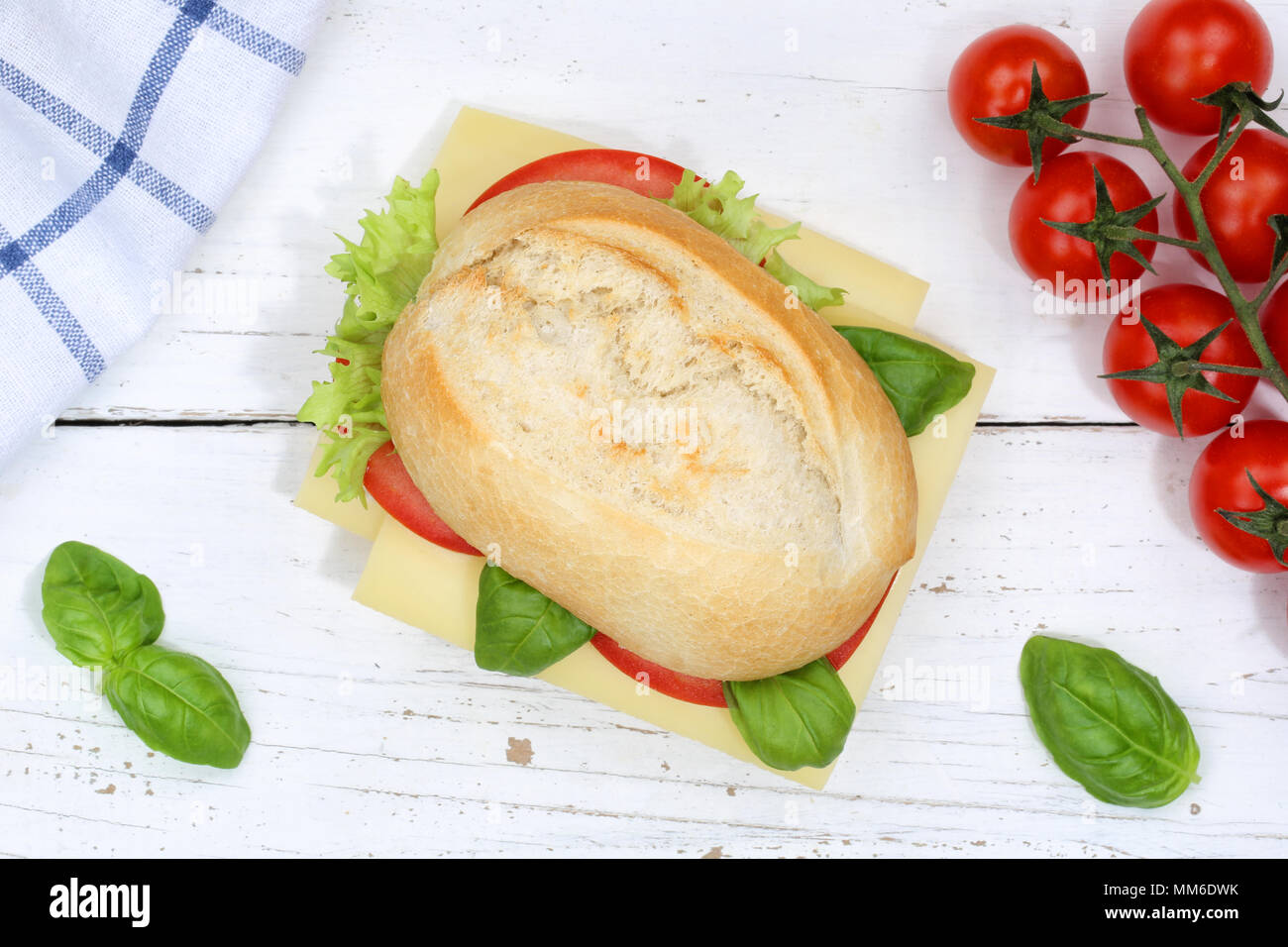 Sandwich baguette with cheese from above on wooden board wood Stock Photo