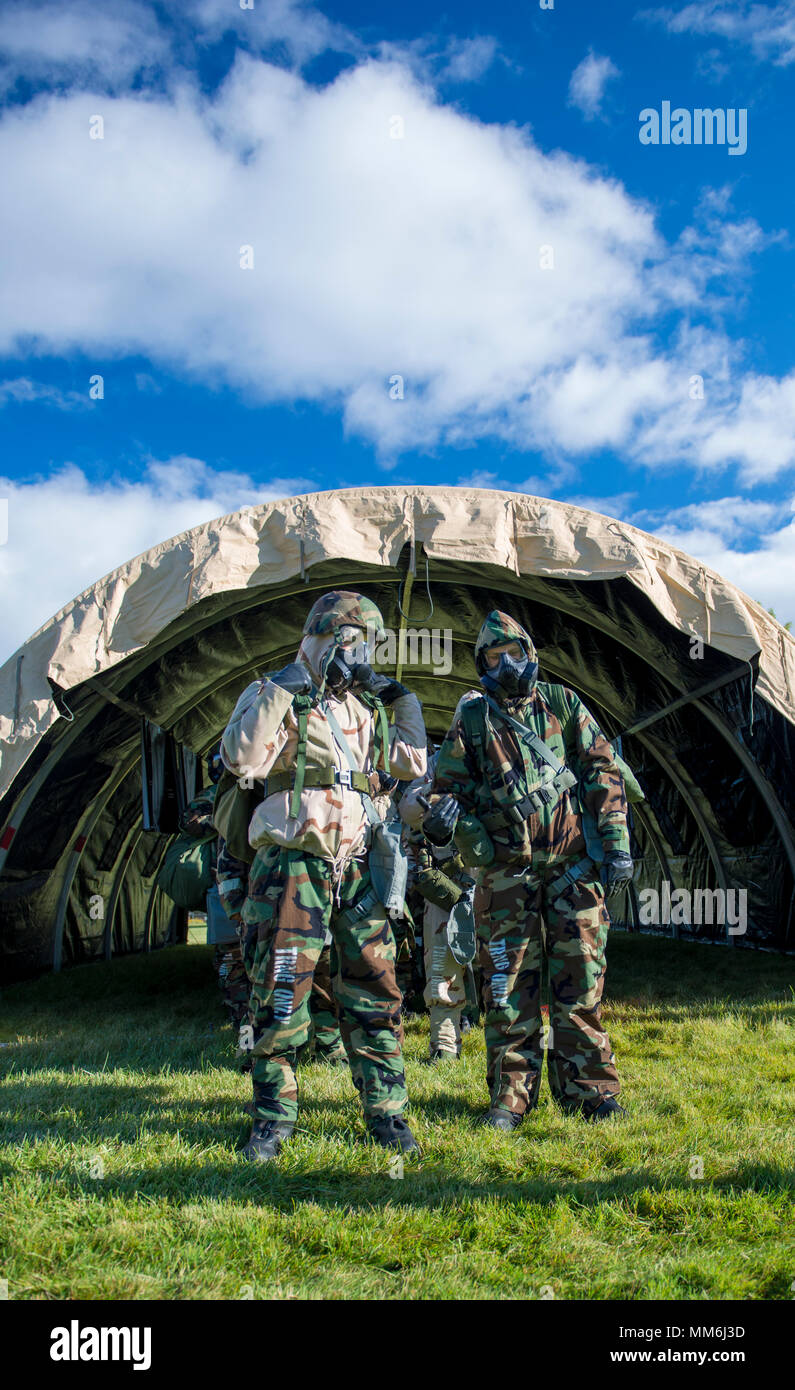 Reserve Citizen Airmen from the 914th Air Refueling Wing participate in an annual readiness assessment, conducted at Niagara Falls Air Reserve Station, N.Y., September 9, 2017. The assessment is meant to guage the unit's ability to operate in different protective postures (MOPP) as well as perform self aid and buddy care. (U.S. Air Force photo by Tech. Sgt. Steph Sawyer) Stock Photo