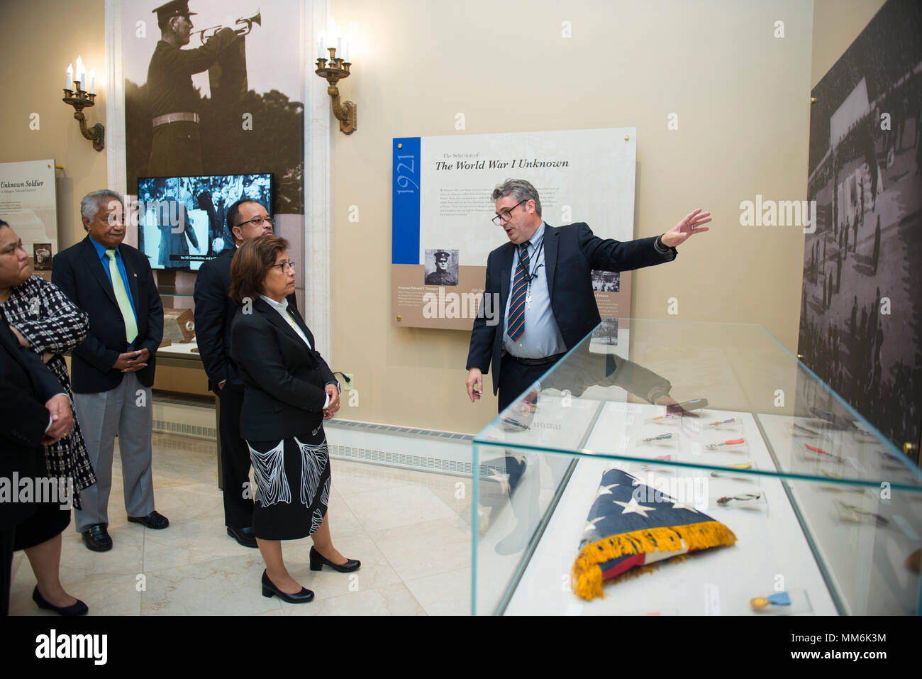 President of the Republic of the Marshall Islands, H.E. Hilda C. Heine  (center), and members of the Republic of the Marshall Islands delegation  receive a tour from Roderick Gainer, historian, Arlington National