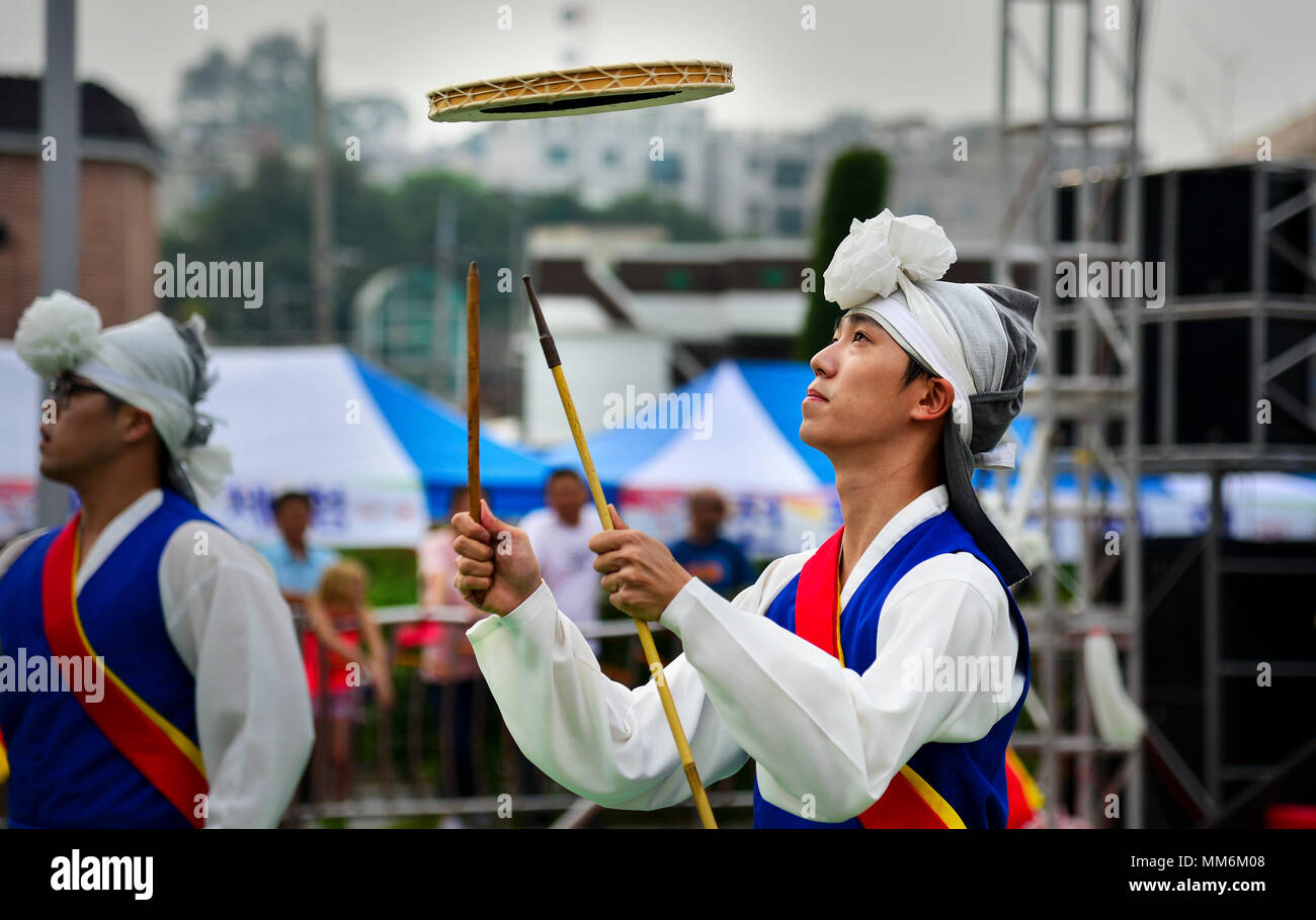 A Korean citizen performs a traditional dance at the 14th Annual Korean American Cultural Friendship Festival near Osan Air Base, Republic of Korea on September 9, 2017. The festival is held to celebrate and strengthen Korean and American relationships. (U.S. Air Force photo by Airman 1st Class Gwendalyn Smith) Stock Photo