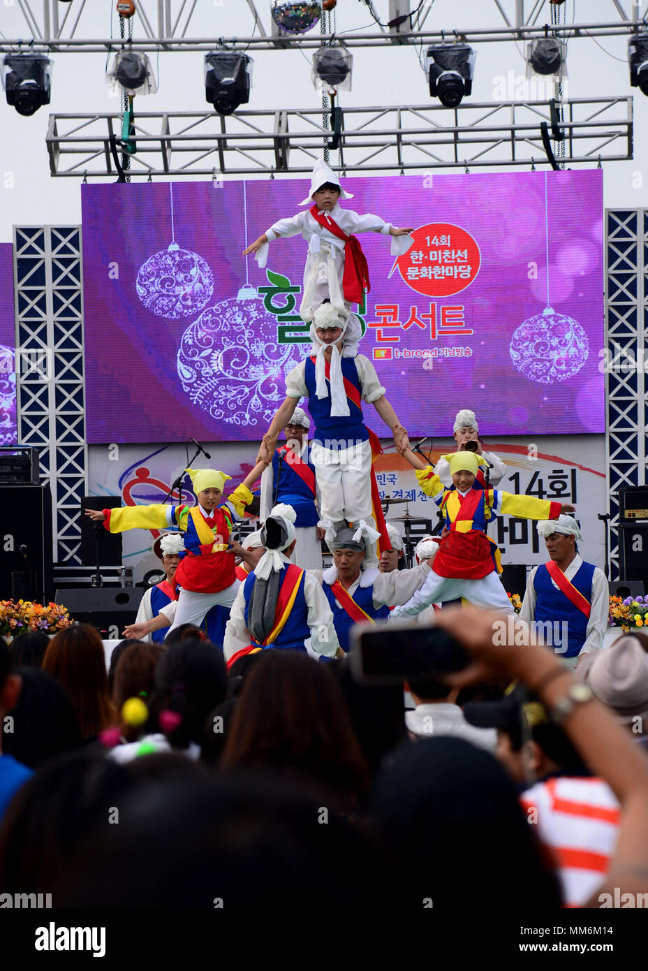 A group of dancers perform a traditional Korean dance during the 14th Annual Korean American Cultural Friendship Festival near Osan Air Base, September 9, 2017. The festival is a two day celebration of the united community between the Korean and American people near Osan Air Base. (U.S. Air Force photo by Staff Sgt. Tinese Jackson) Stock Photo