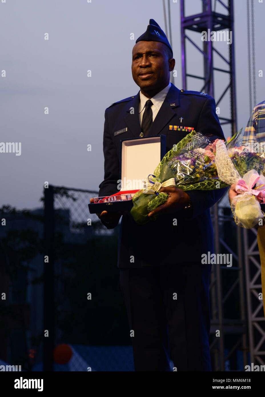 U.S. Air Force Capt. Joseph Idomele, 51st Fighter Wing chaplain receives an award during the 14th Annual Korean American Cultural Friendship Festival near Osan Air Base, September 9, 2017. The festival celebrates both Korean and Americans who strive to make the local community a great place to live. (U.S. Air Force photo by Staff Sgt. Tinese Jackson) Stock Photo