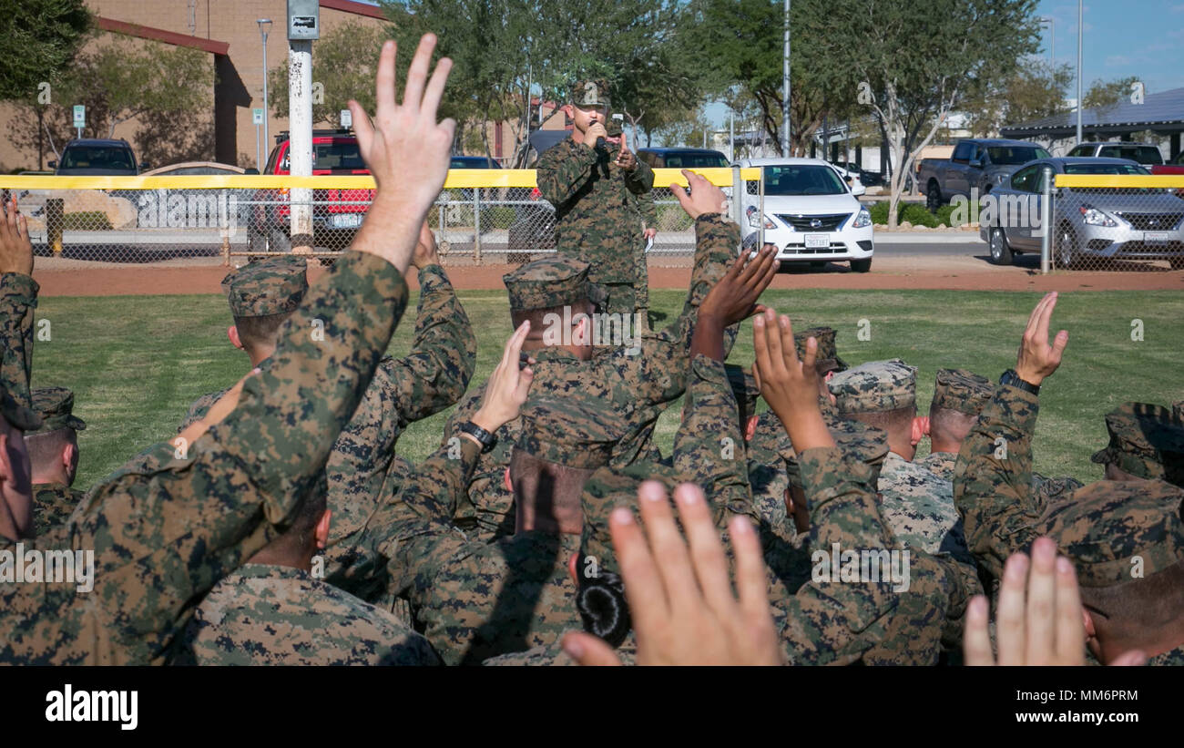 U.S. Marine Corps Col. James Wellons, commanding officer, Marine Aviation Weapons and Tactics Squadron One (MAWTS-1) gives a speech during Weapons Tactics Instructor Course (WTI) 1-18 at Marine Corps Air Station Yuma, Ariz., Sept. 13, 2017. WTI is a seven-week training event hosted by MAWTS-1 cadre, which emphasizes operational integration of the six functions of Marine Corps aviation in support of a Marine Air Ground Task Force and provides standardized advanced tactical training and certification of unit instructor qualifications to support Marine aviation Training and Readiness and assists  Stock Photo