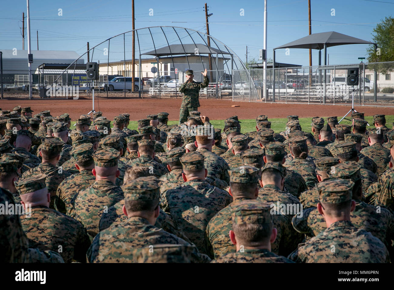 U.S. Marine Corps Col. James Wellons, commanding officer, Marine Aviation Weapons and Tactics Squadron One (MAWTS-1) gives a speech during Weapons Tactics Instructor Course (WTI) 1-18 at Marine Corps Air Station Yuma, Ariz., Sept. 13, 2017. WTI is a seven-week training event hosted by MAWTS-1 cadre, which emphasizes operational integration of the six functions of Marine Corps aviation in support of a Marine Air Ground Task Force and provides standardized advanced tactical training and certification of unit instructor qualifications to support Marine aviation Training and Readiness and assists  Stock Photo