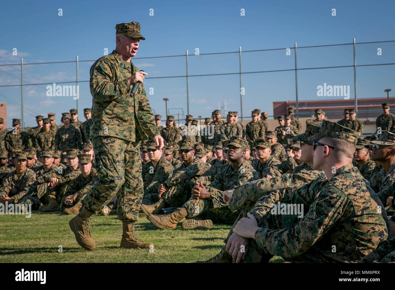 U.S. Marine Corps Sgt. Maj. Thomas Foster, sergeant major, Marine Aviation Weapons and Tactics Squadron One (MAWTS-1) gives a speech during Weapons Tactics Instructor Course (WTI) 1-18 at Marine Corps Air Station Yuma, Ariz., Sept. 13, 2017. WTI is a seven-week training event hosted by MAWTS-1 cadre, which emphasizes operational integration of the six functions of Marine Corps aviation in support of a Marine Air Ground Task Force and provides standardized advanced tactical training and certification of unit instructor qualifications to support Marine aviation Training and Readiness and assists Stock Photo