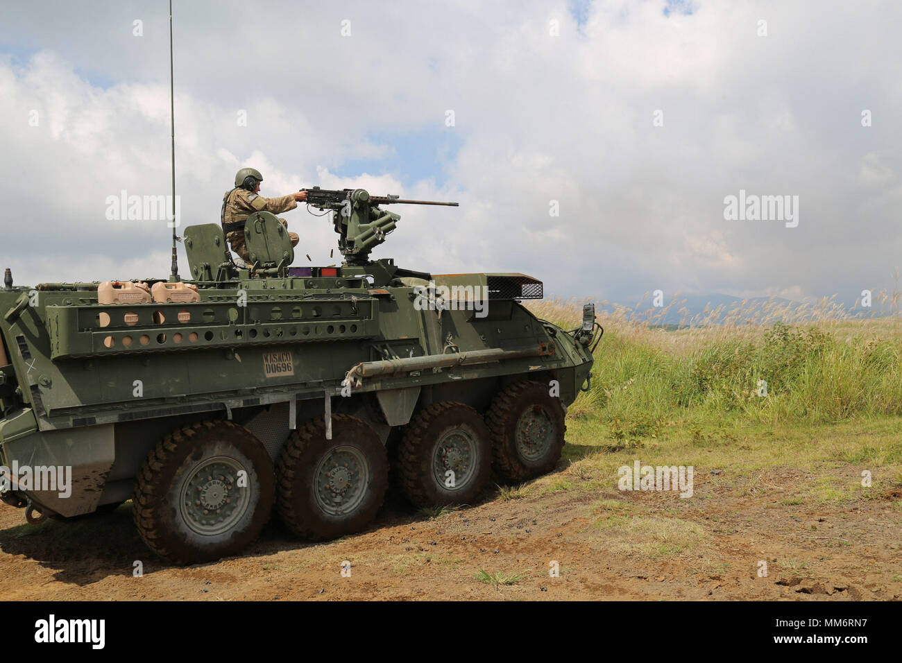 U.S. Army Stryker vehicle crew engages targets using an M2 .50 caliber ...
