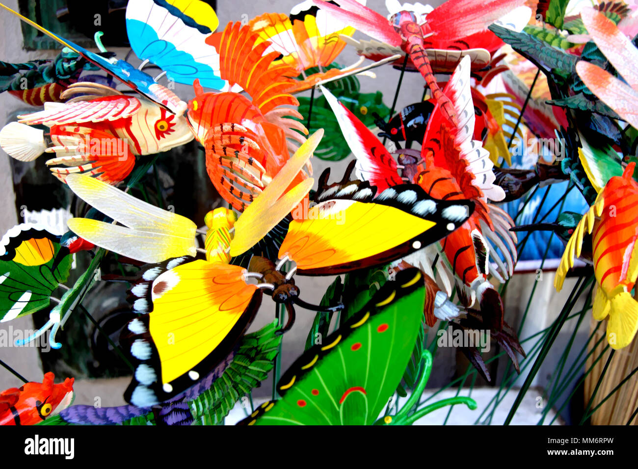 Souvenir butterflies and fish outside of a tourist shop on Grant Avenue in San Francisco's Chinatown. Image processed with Photoshop filters. Stock Photo