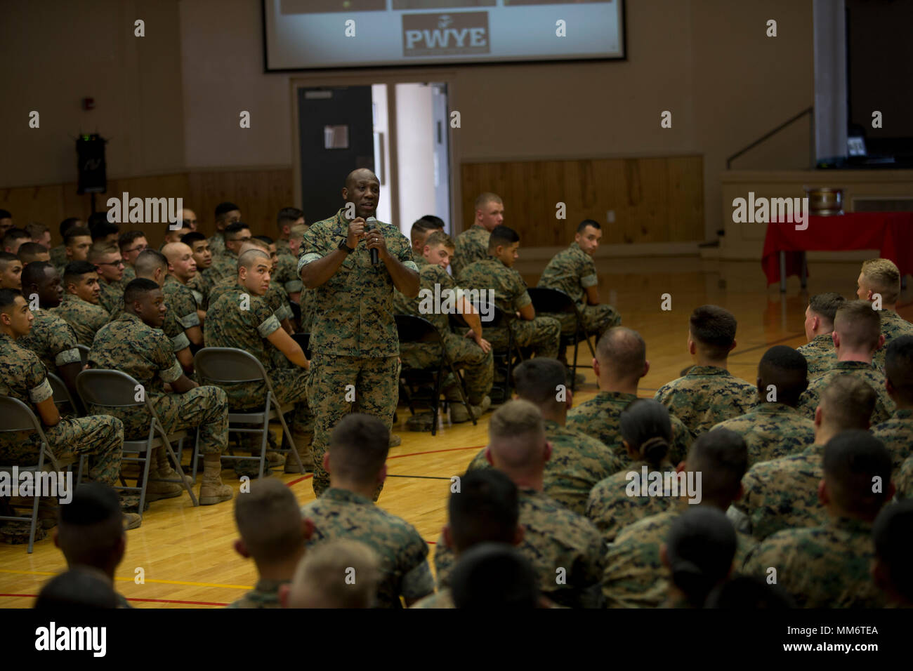 Sgt. Maj. of the United States Marine Corps, Ronald L. Green addresses Marines and Sailors at Marine Corps Combat Service Support Schools and Field Medical Training Battalion-East on Camp Johnson, N.C., Sept. 7, 2017. Commandant of the Marince Corps, Robert B. Neller and Green visited Camp Johnson to inform Marines and Sailors on various subjects pertaining to the Marine Corps. (U.S. Marine Corps photo by Lance Cpl. Luis E. Zamot III) Stock Photo