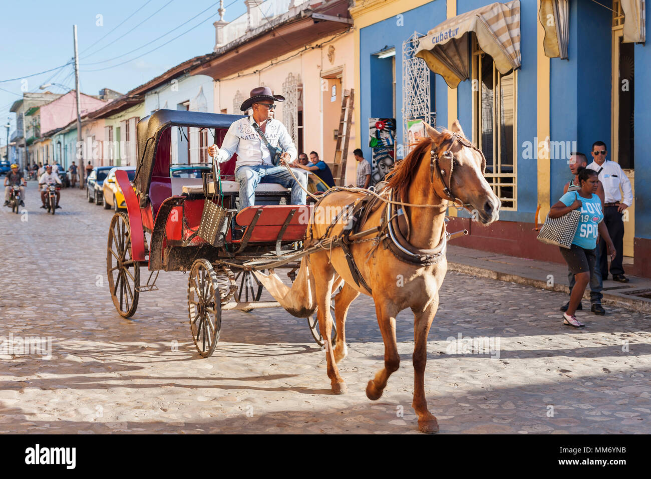 Man riding on horse cart in Trinidad old town, Cuba Stock Photo