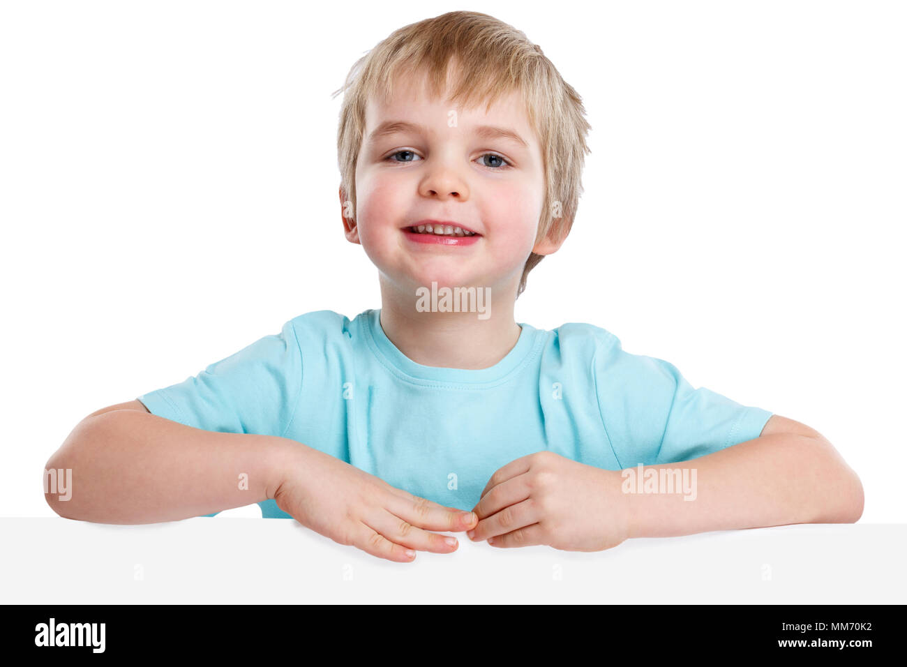 Child kid smiling young little boy copyspace marketing empty blank sign isolated on a white background Stock Photo