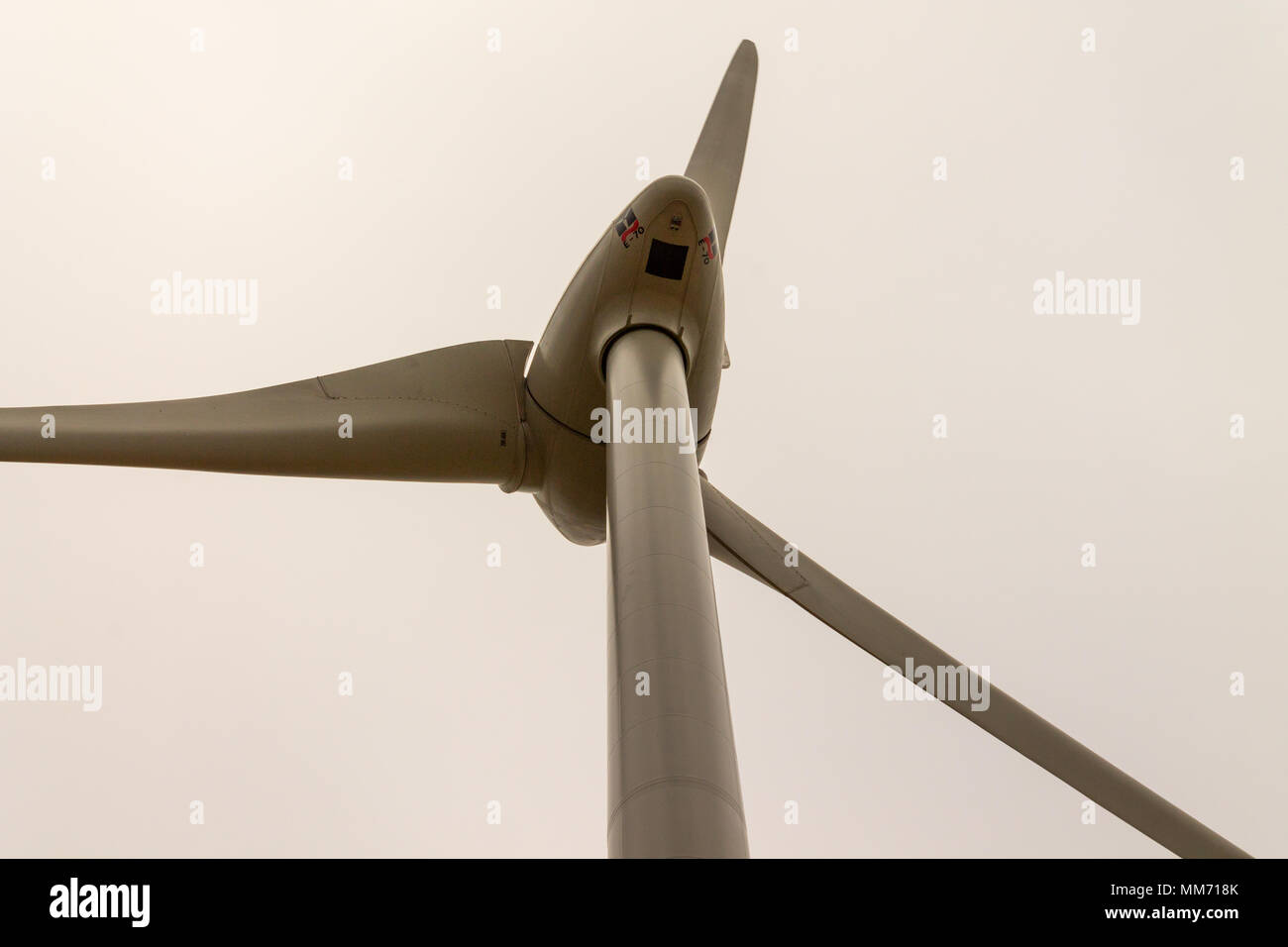 turbine blades spinning on a wind farm, windfarm on a hillside of west cork, ireland Stock Photo