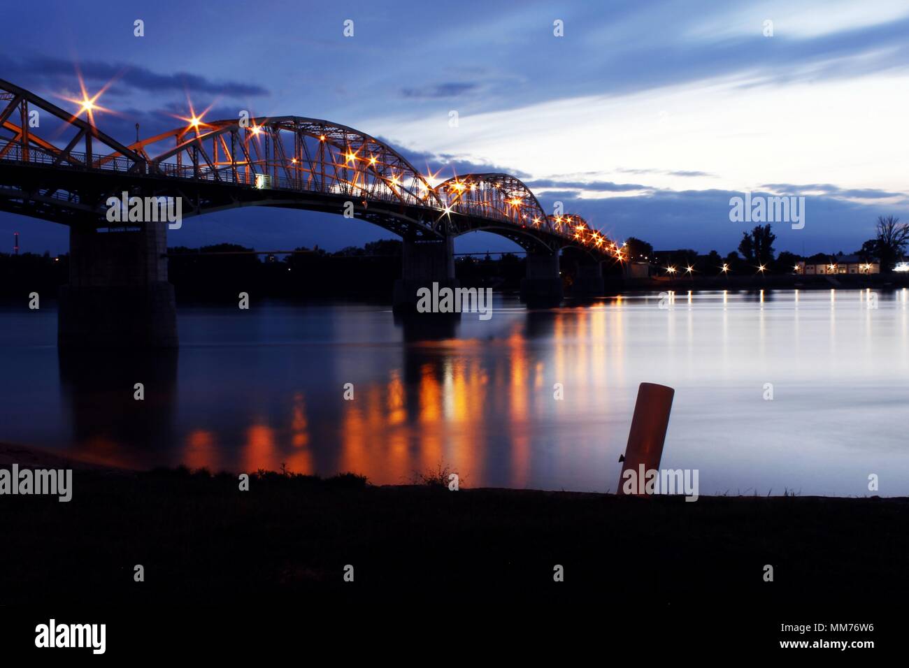 Bridge Maria Valeria in colors of sundown in Sturovo. Stock Photo