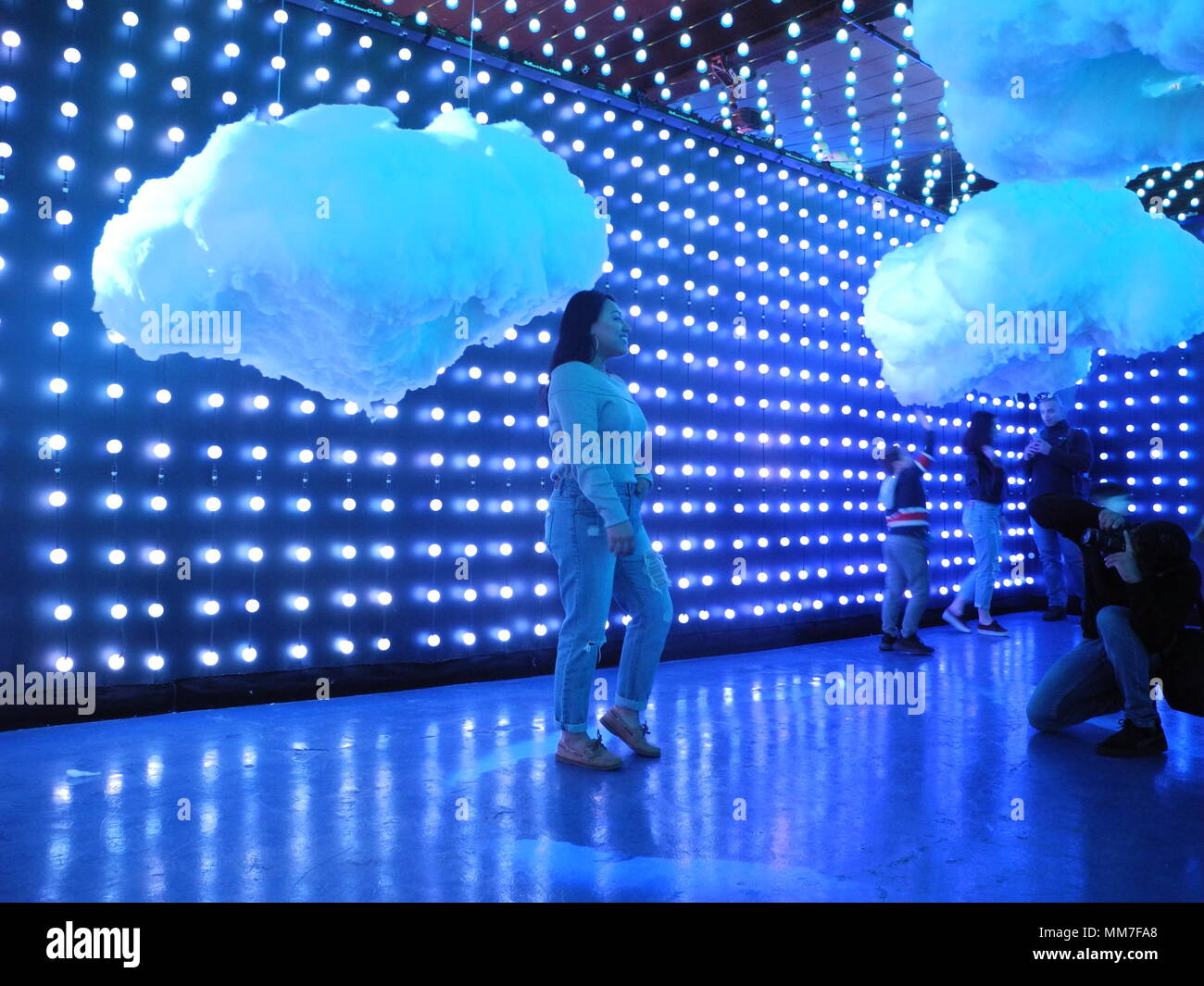 Walk In Dream Machine FILED - 20 April 2018, USA, New York: Visitors photograph each other in ...