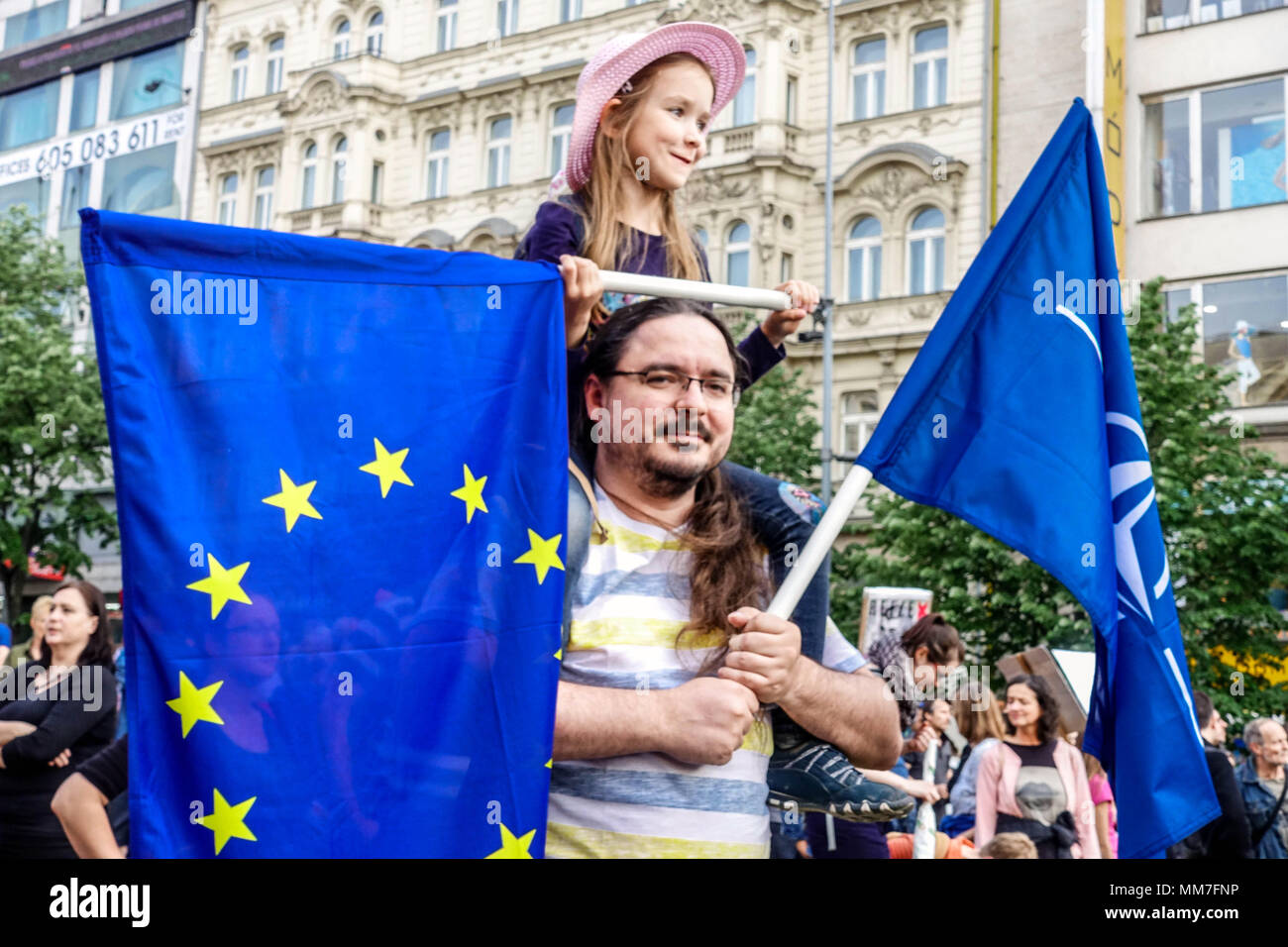 Prague Demonstration against Prime Minister Babis, President Zeman and the Communists, Czech Supporters with EU European Union flag people Man Father Child Girl Stock Photo