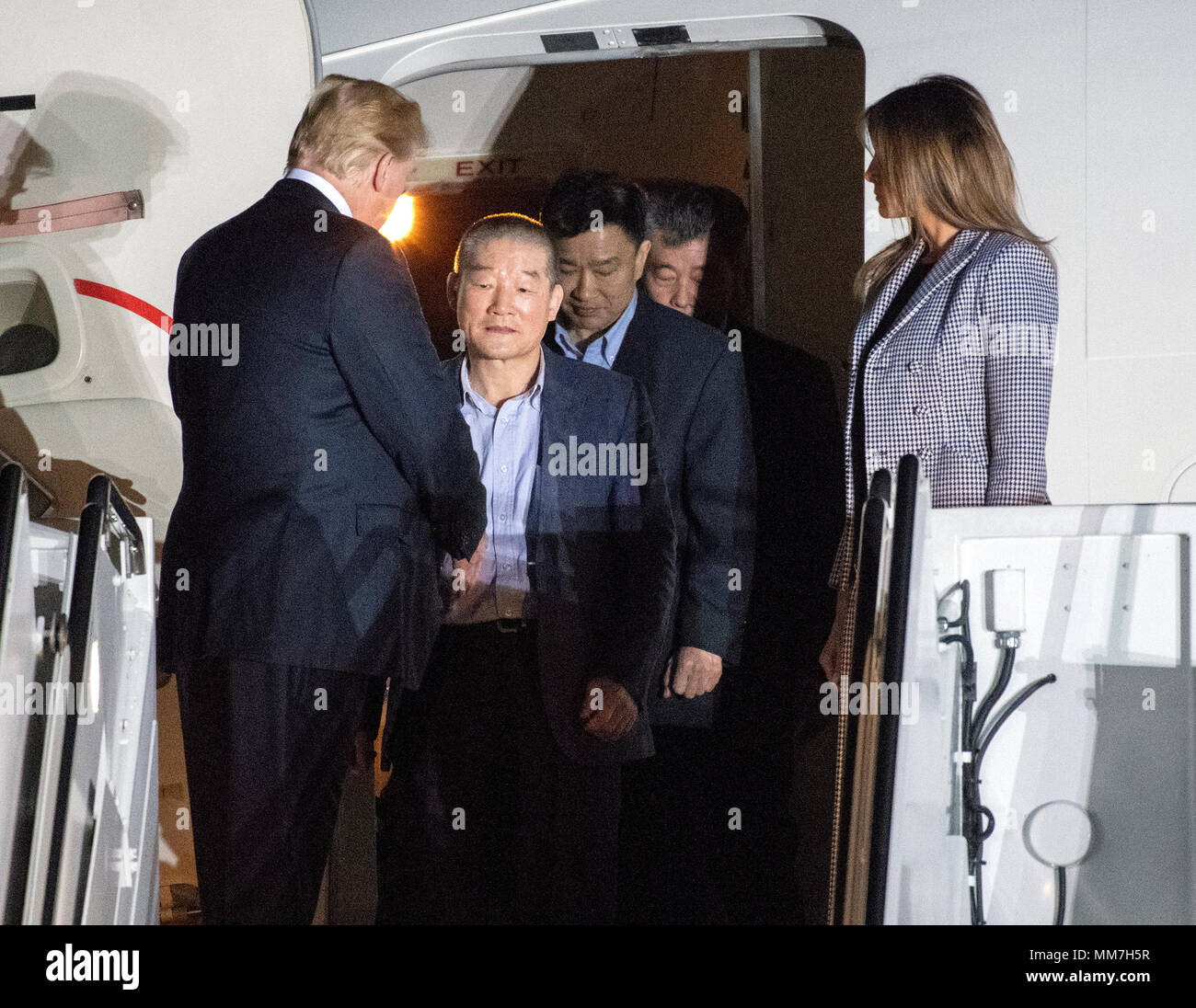 United States President Donald J. Trump welcomes Kim Dong Chul, Kim Hak Song and Tony Kim back to the US at Joint Base Andrews in Maryland on Thursday, May 10, 2018. The three men were imprisoned in North Korea for periods ranging from one and two years. They were released to US Secretary of State Mike Pompeo as a good-will gesture in the lead-up to the talks between President Trump and North Korean leader Kim Jong Un. Credit: Ron Sachs/CNP | usage worldwide Stock Photo