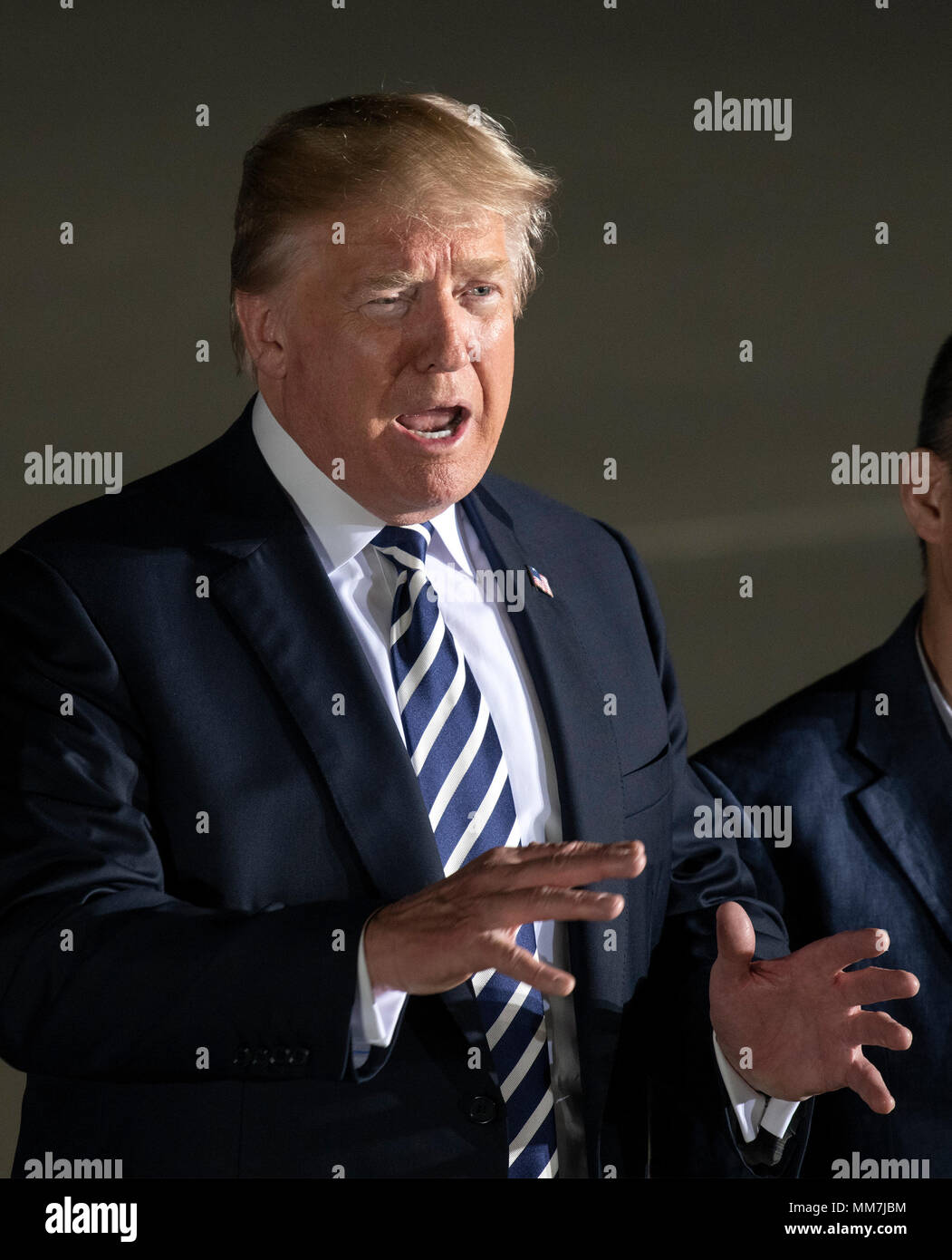 Joint Base Andrews, Maryland, USA. 10th May, 2018. United States President Donald J. Trump makes remarks to the press as he welcomes Kim Dong Chul, Kim Hak Song and Tony Kim back to the US at Joint Base Andrews in Maryland on Thursday, May 10, 2018. The three men were imprisoned in North Korea for periods ranging from one and two years. Credit: dpa picture alliance/Alamy Live News Stock Photo