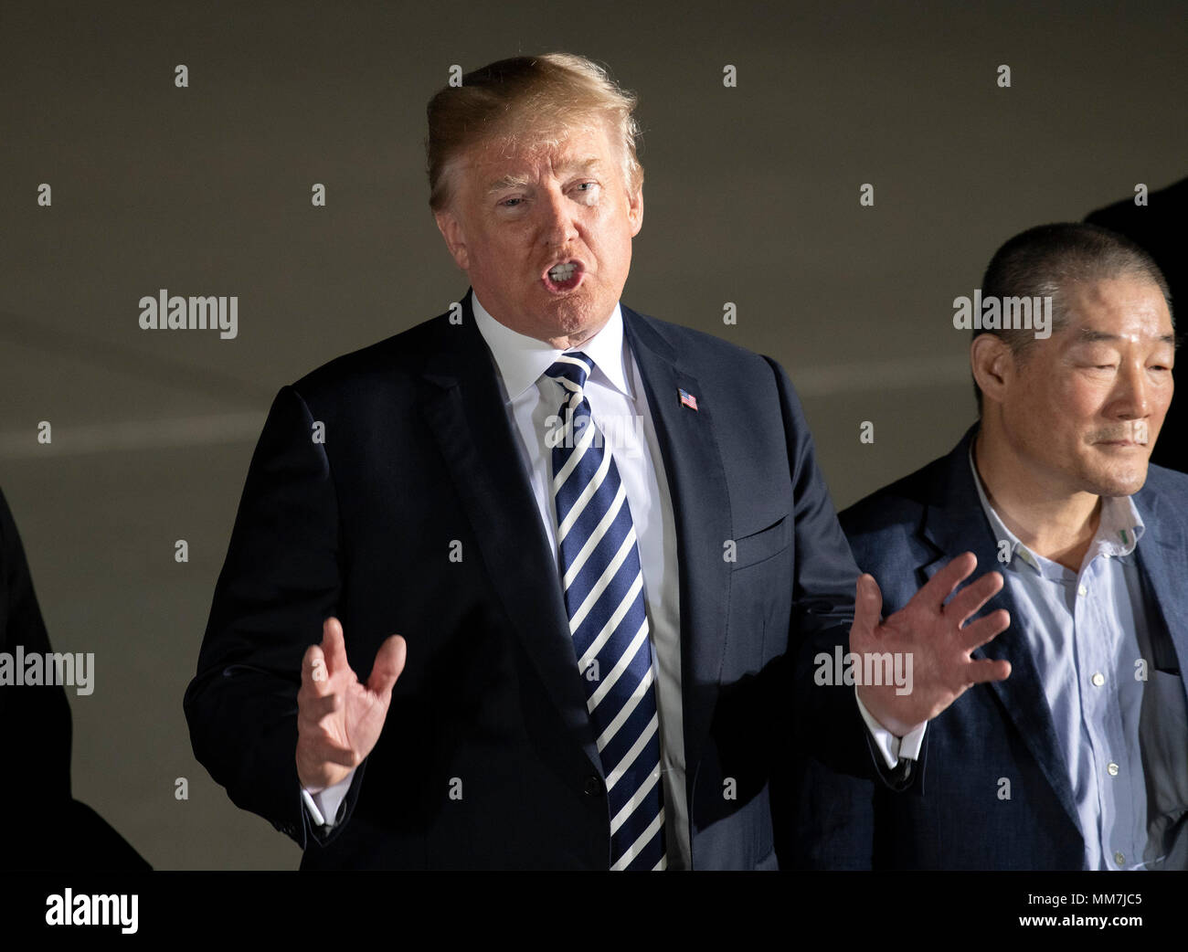 Joint Base Andrews, Maryland, USA. 10th May, 2018. United States President Donald J. Trump makes remarks to the press as he welcomes Kim Dong Chul, Kim Hak Song and Tony Kim back to the US at Joint Base Andrews in Maryland on Thursday, May 10, 2018. The three men were imprisoned in North Korea for periods ranging from one and two years. Credit: dpa picture alliance/Alamy Live News Stock Photo
