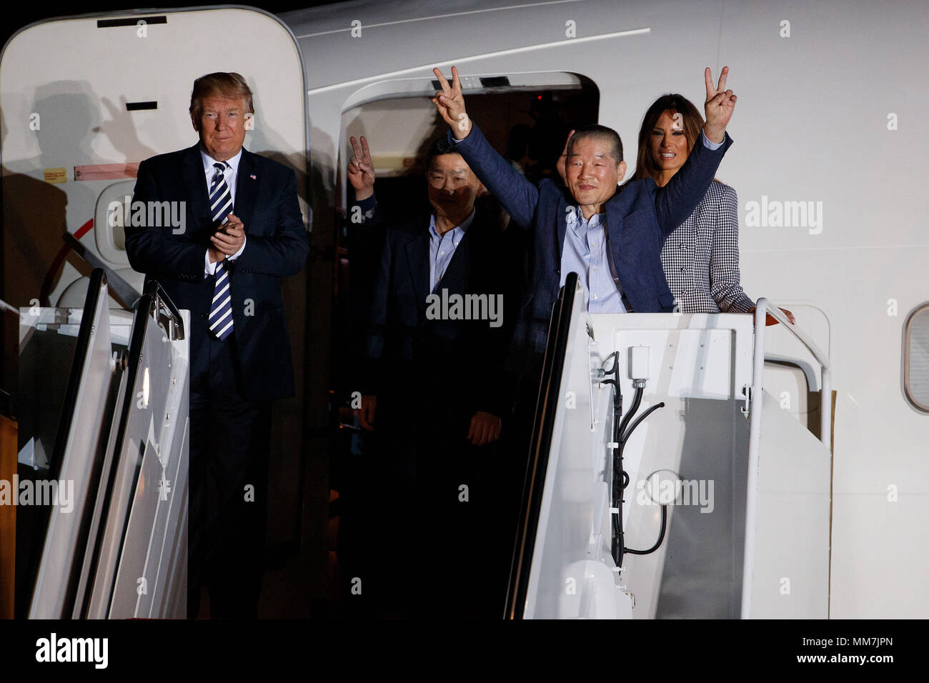 (180510) -- WASHINGTON D.C., May 10, 2018 (Xinhua) -- U.S. President Donald Trump (1st L), his wife Melania Trump (1st R) welcome Kim Dong-chul, Kim Hak-song and Tony Kim back to the United States at Joint Base Andrews in Washington, DC, the United States, May 10, 2018. Three U.S. citizens that were just freed by the Democratic People's Republic of Korea (DPRK) arrived in Washington early Thursday, as the two countries saw their ties warm up in recent weeks. The three detainees, named Kim Hak-song, Tony Kim, Kim Dong-chul, are all U.S. citizens of Korean descent. They were arrested by DPRK au Stock Photo