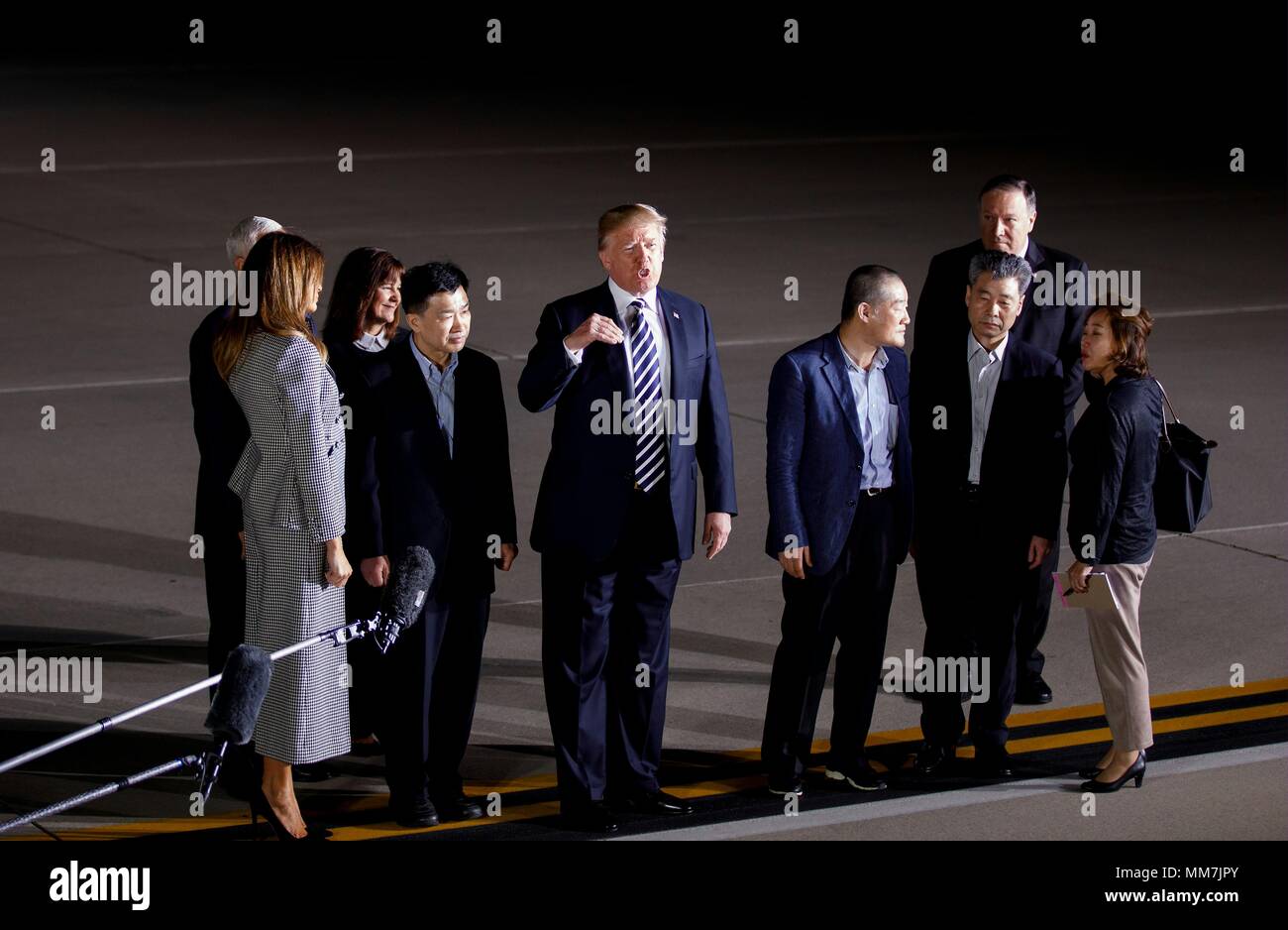 (180510) -- WASHINGTON D.C., May 10, 2018 (Xinhua) -- U.S. President Donald Trump (C) speaks to the media after welcoming Kim Dong-chul, Kim Hak-song and Tony Kim back to the United States at Joint Base Andrews in Washington, DC, the United States, May 10, 2018. Three U.S. citizens that were just freed by the Democratic People's Republic of Korea (DPRK) arrived in Washington early Thursday, as the two countries saw their ties warm up in recent weeks. The three detainees, named Kim Hak-song, Tony Kim, Kim Dong-chul, are all U.S. citizens of Korean descent. They were arrested by DPRK authoritie Stock Photo