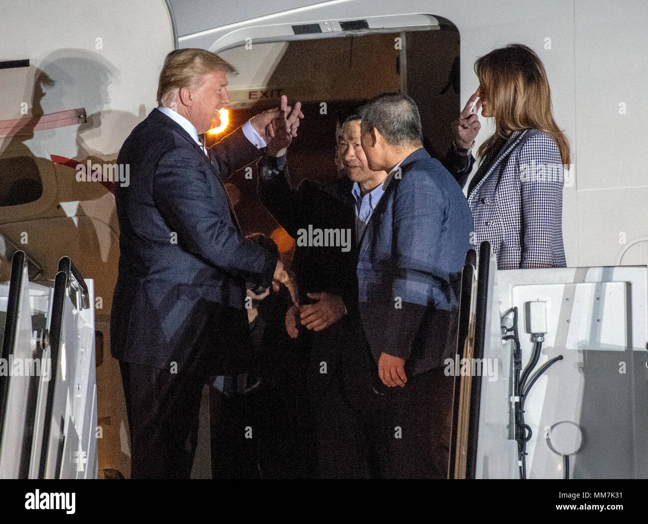 Joint Base Andrews, Maryland, USA. 10th May, 2018. United States President Donald J. Trump welcomes Kim Dong Chul, Kim Hak Song and Tony Kim back to the US at Joint Base Andrews in Maryland on Thursday, May 10, 2018. The three men were imprisoned in North Korea for periods ranging from one and two years. Credit: dpa picture alliance/Alamy Live News Stock Photo