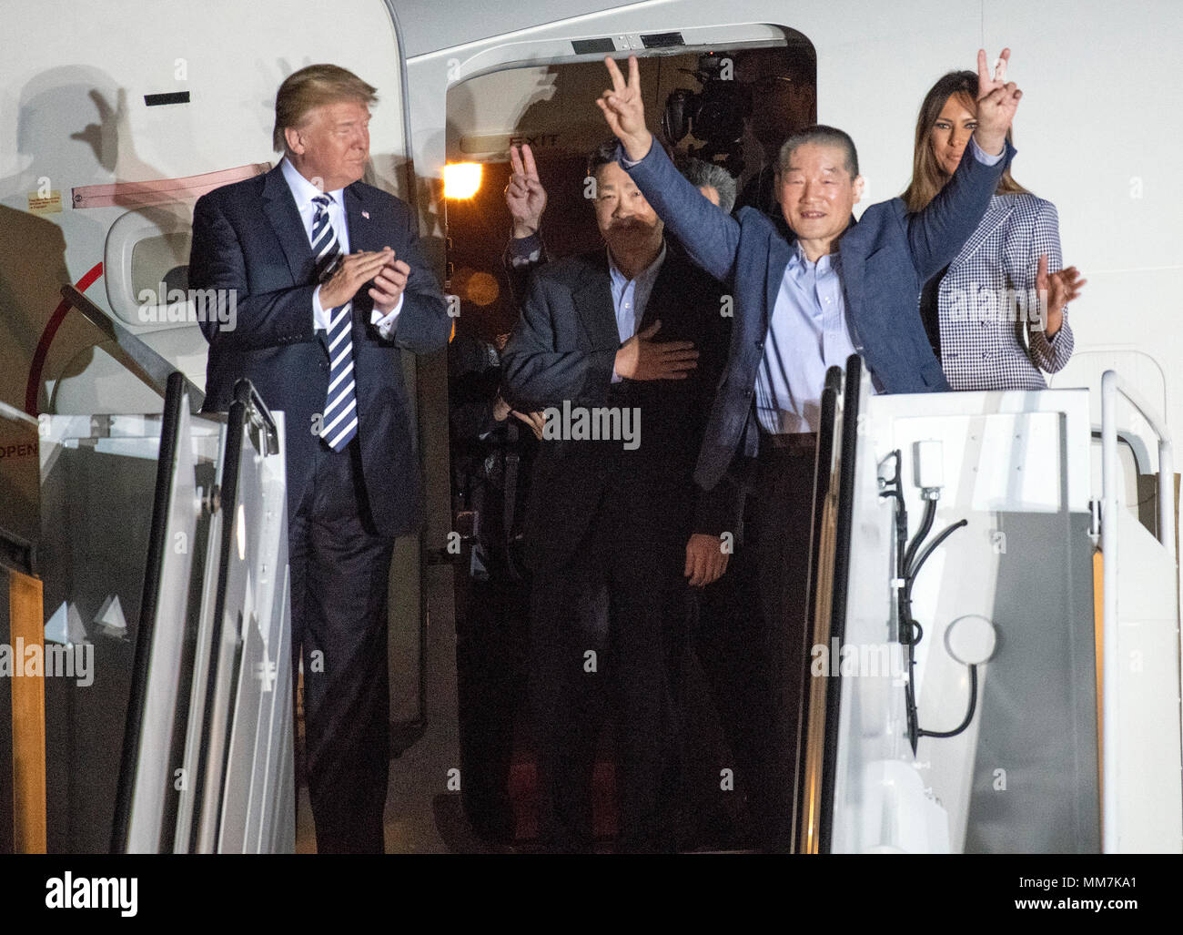 United States President Donald J. Trump welcomes Kim Dong Chul, Kim Hak Song and Tony Kim back to the US at Joint Base Andrews in Maryland on Thursday, May 10, 2018. The three men were imprisoned in North Korea for periods ranging from one and two years. They were released to US Secretary of State Mike Pompeo as a good-will gesture in the lead-up to the talks between President Trump and North Korean leader Kim Jong Un. Credit: Ron Sachs/CNP /MediaPunch Stock Photo